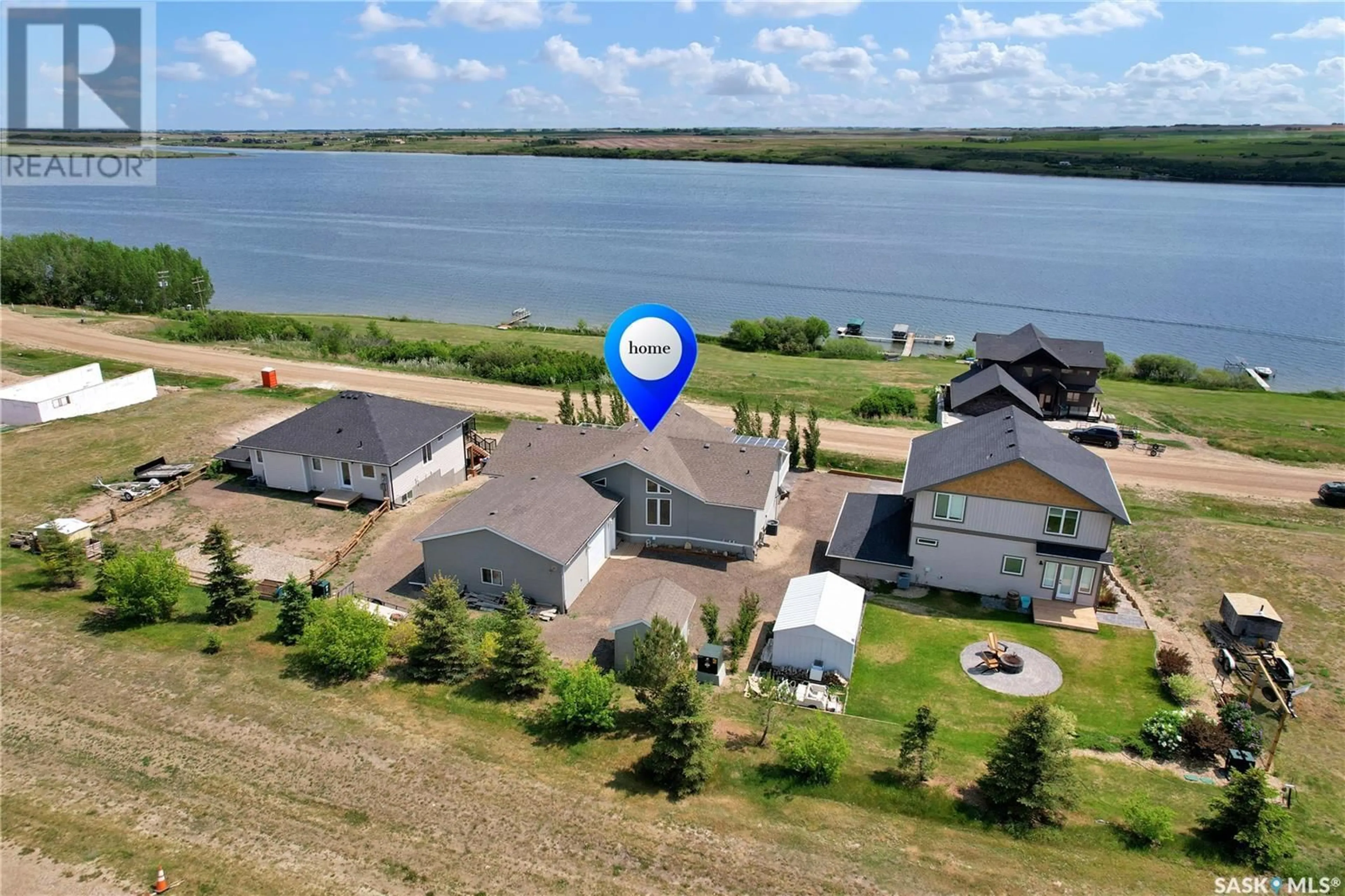 A pic from outside/outdoor area/front of a property/back of a property/a pic from drone, water/lake/river/ocean view for 48 MAWSON DRIVE, Shields Saskatchewan S7C0A2