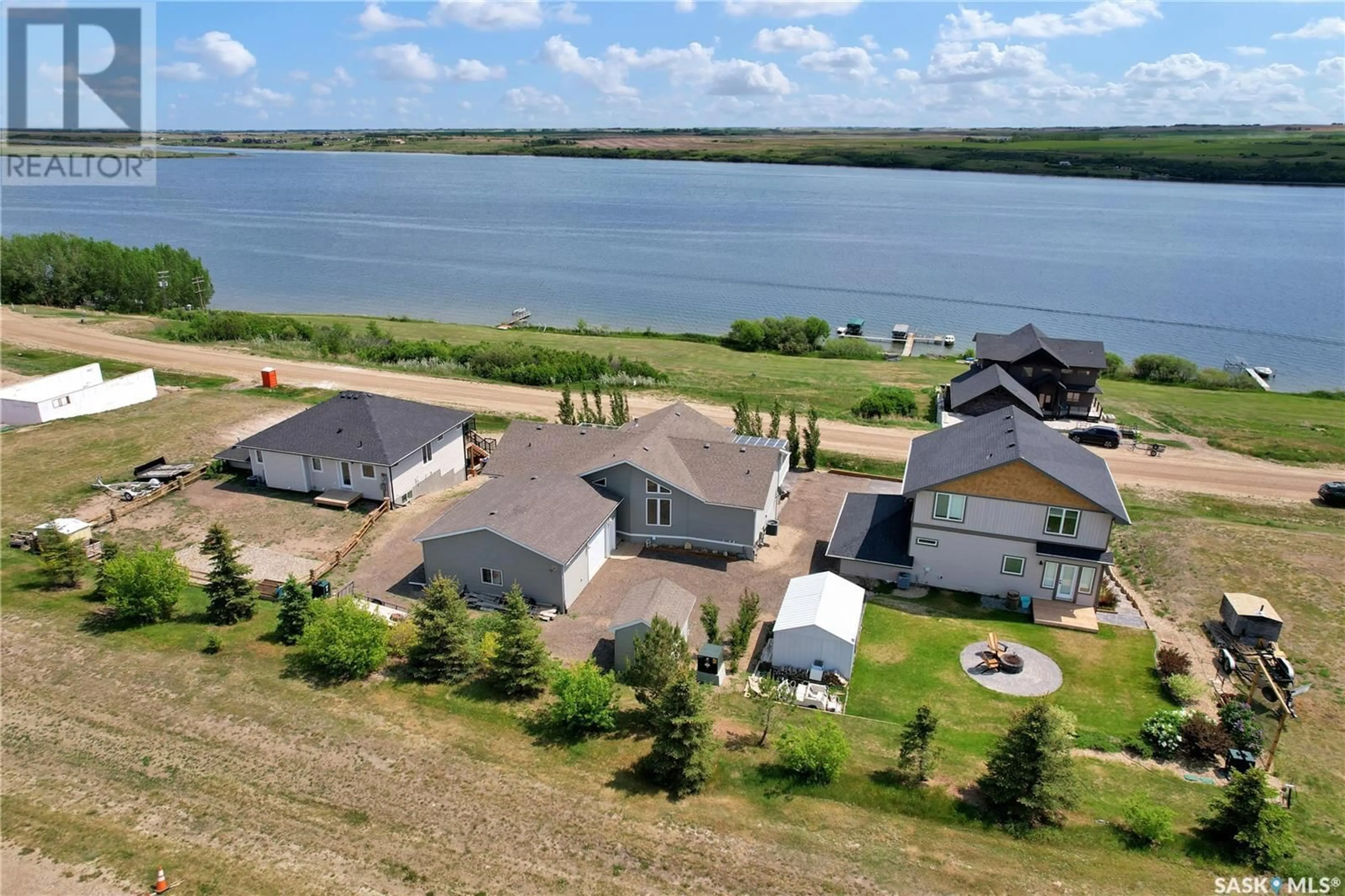 A pic from outside/outdoor area/front of a property/back of a property/a pic from drone, water/lake/river/ocean view for 48 MAWSON DRIVE, Shields Saskatchewan S7C0A2