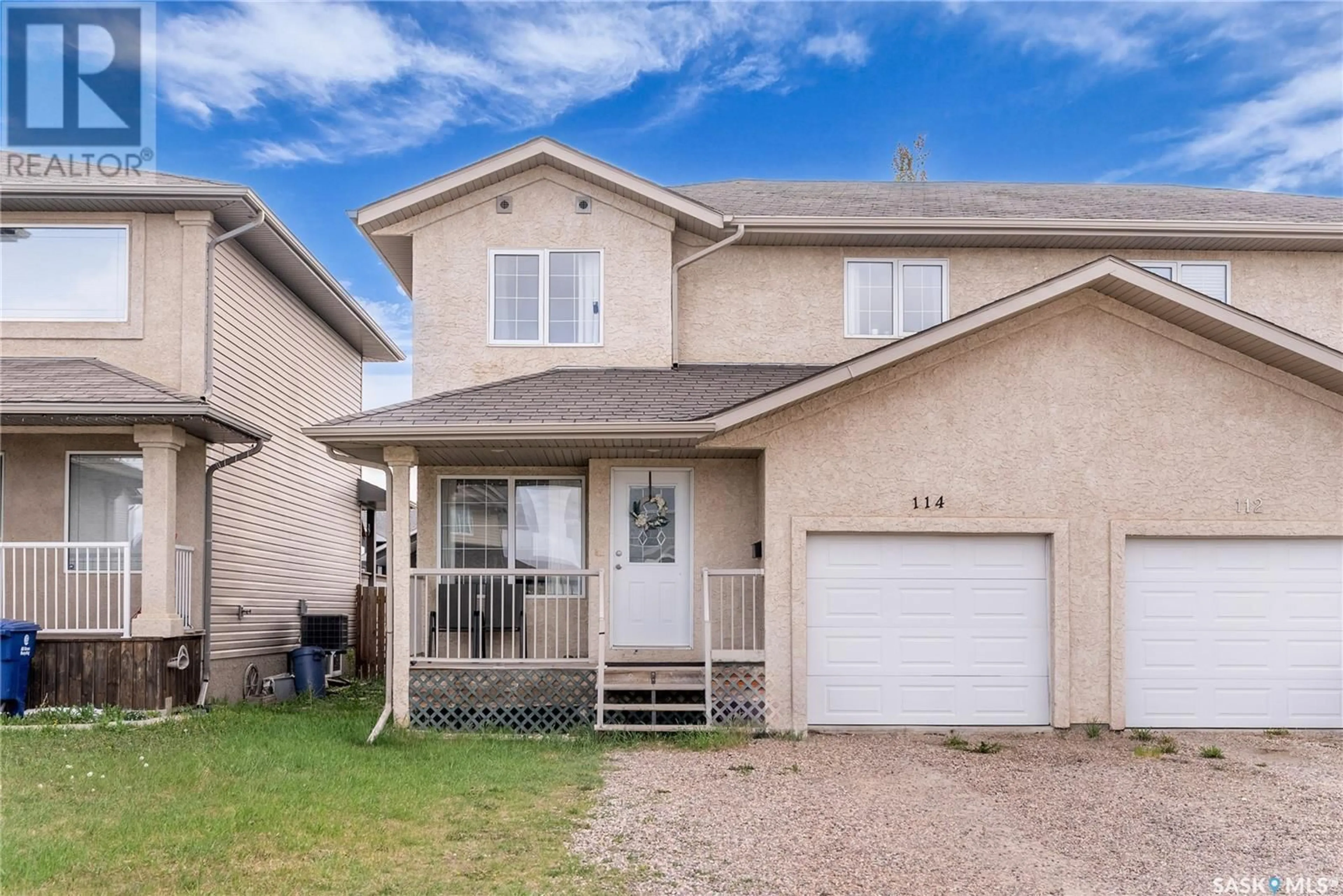 Home with vinyl exterior material, street for 114 MEADOWLARK PARK, Warman Saskatchewan S0K0A1