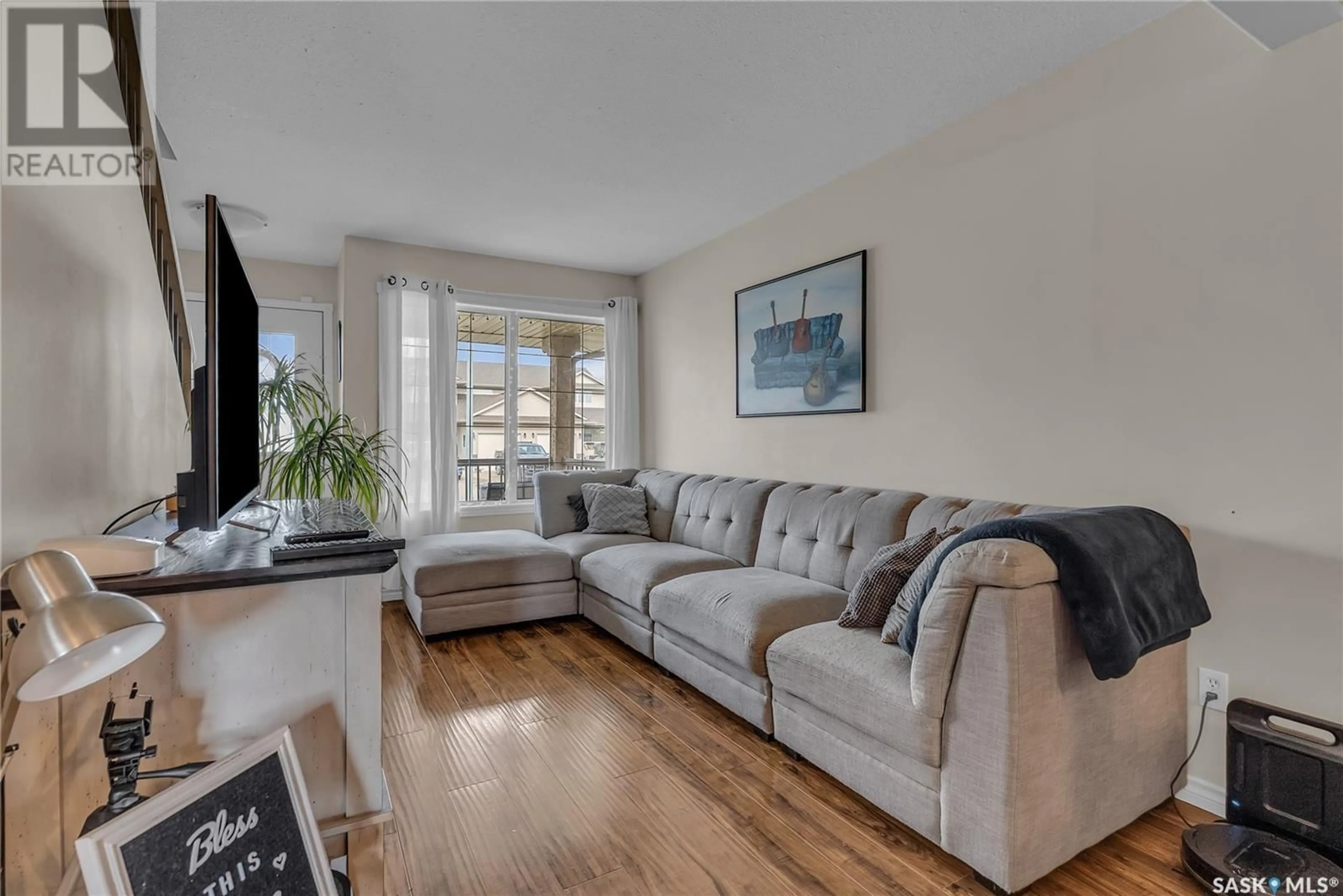 Living room with furniture, unknown for 114 MEADOWLARK PARK, Warman Saskatchewan S0K0A1