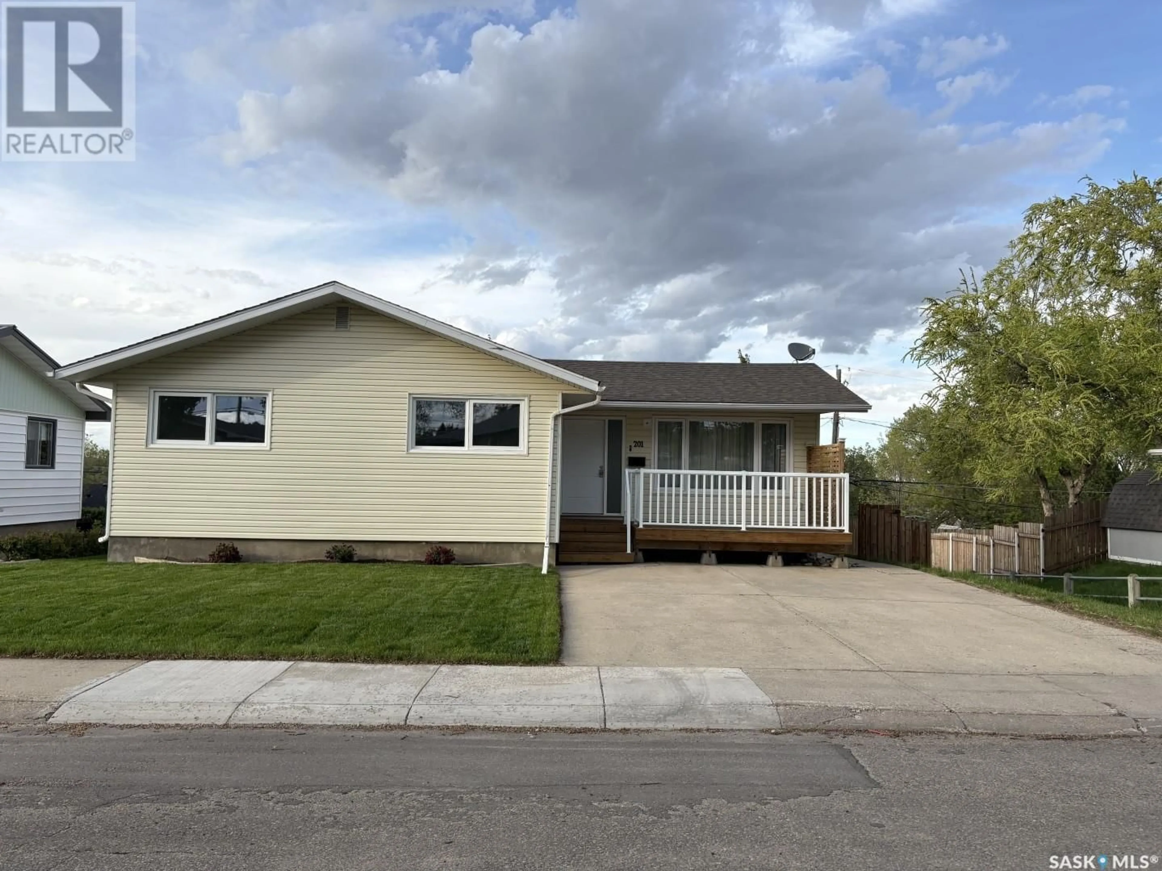 Home with vinyl exterior material, street for 201 CONLIN DRIVE, Swift Current Saskatchewan S9H3A9