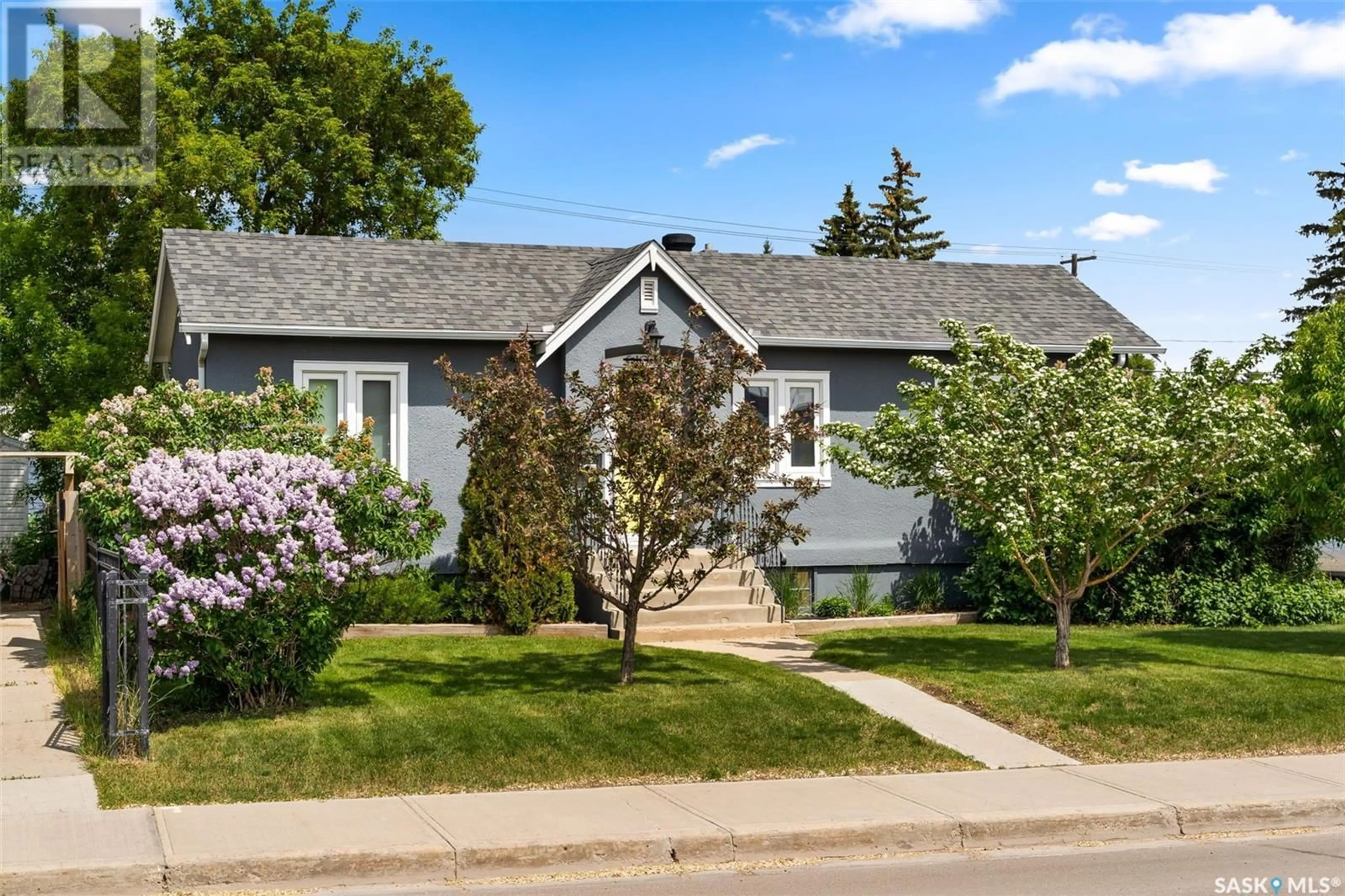 Home with vinyl exterior material, street for 6100 DEWDNEY AVENUE, Regina Saskatchewan S4T1E1