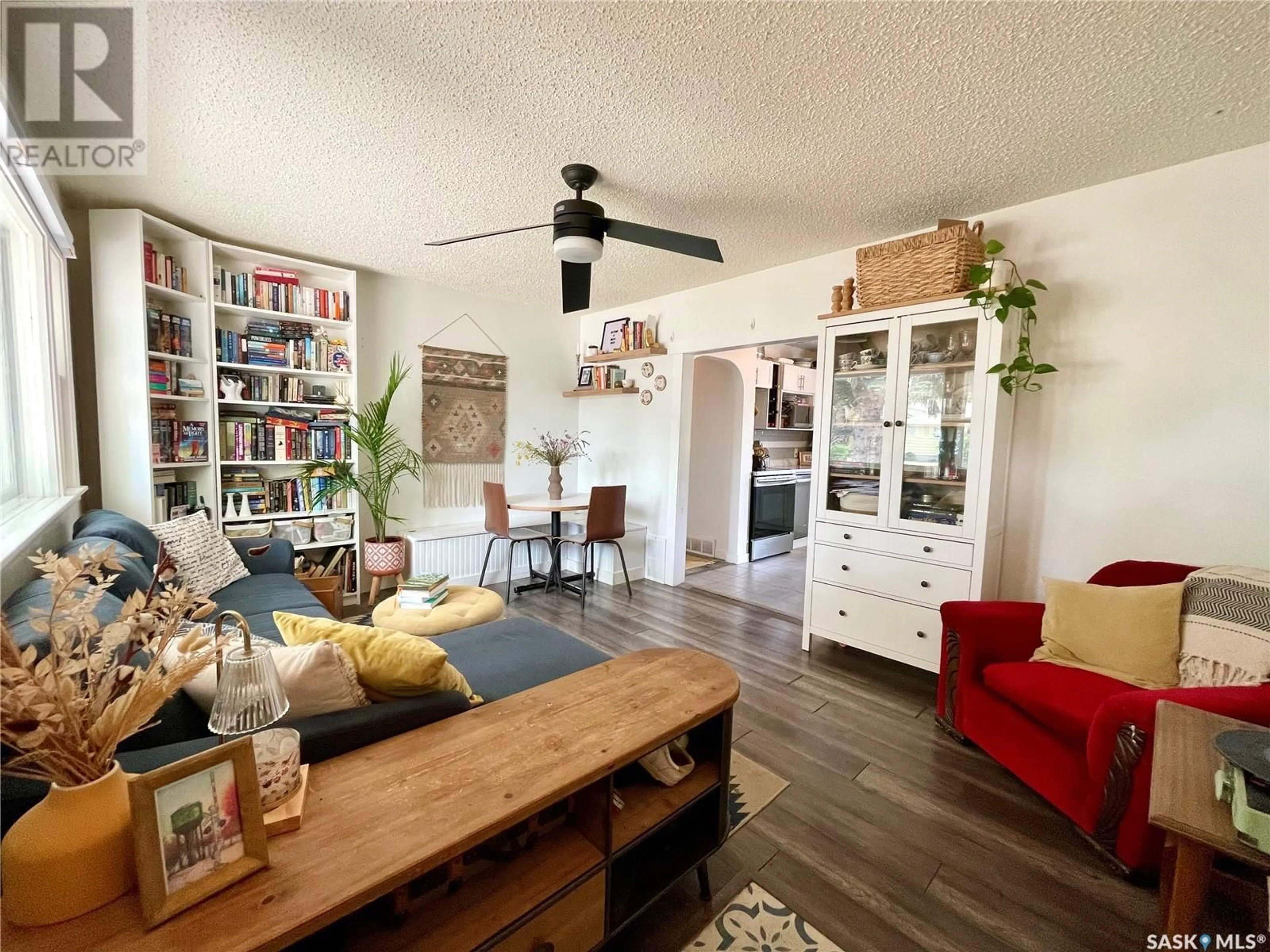 Living room with furniture, wood/laminate floor for 746 GRANDVIEW STREET, Moose Jaw Saskatchewan S6H5L6
