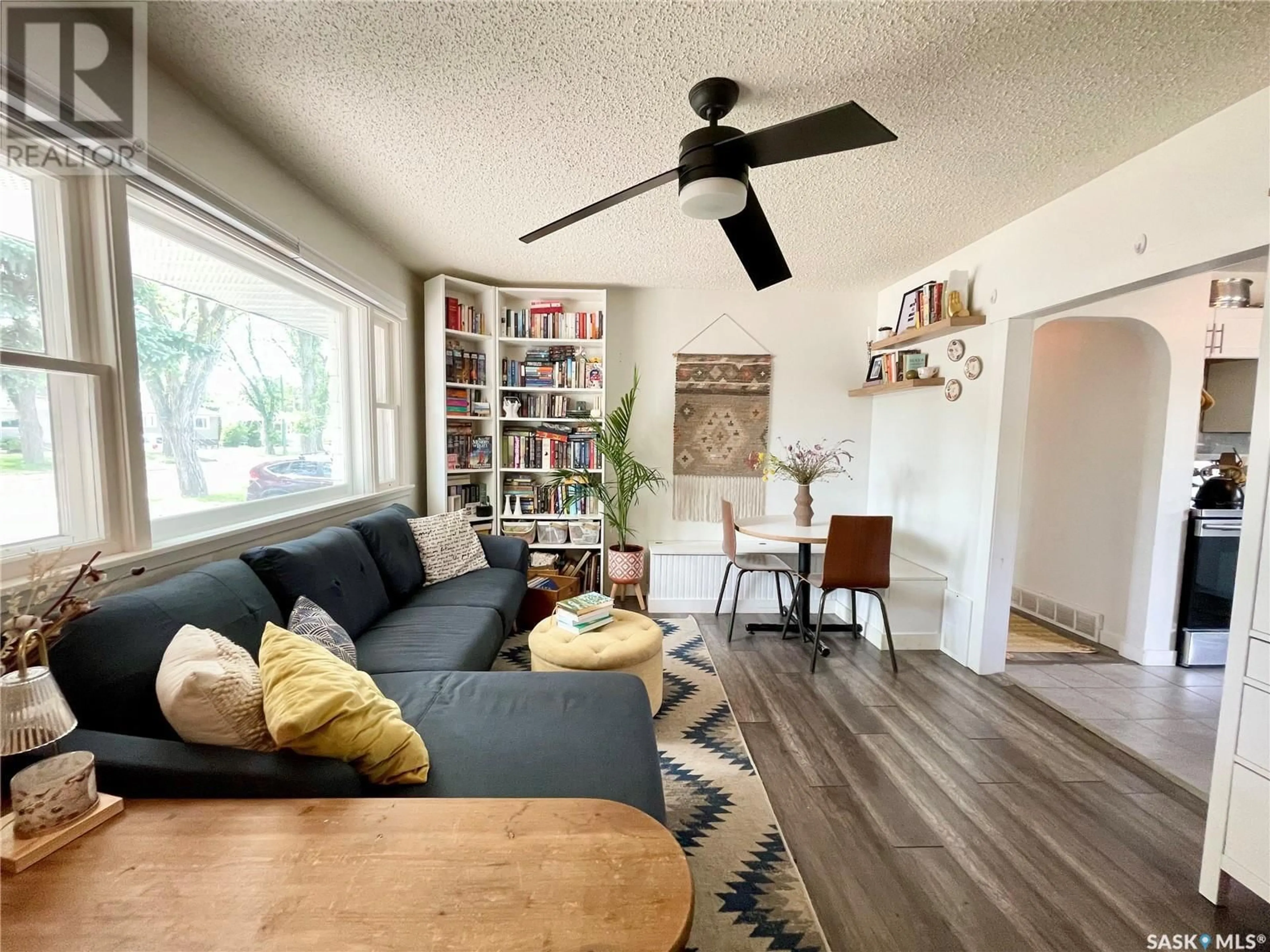 Living room with furniture, wood/laminate floor for 746 GRANDVIEW STREET, Moose Jaw Saskatchewan S6H5L6
