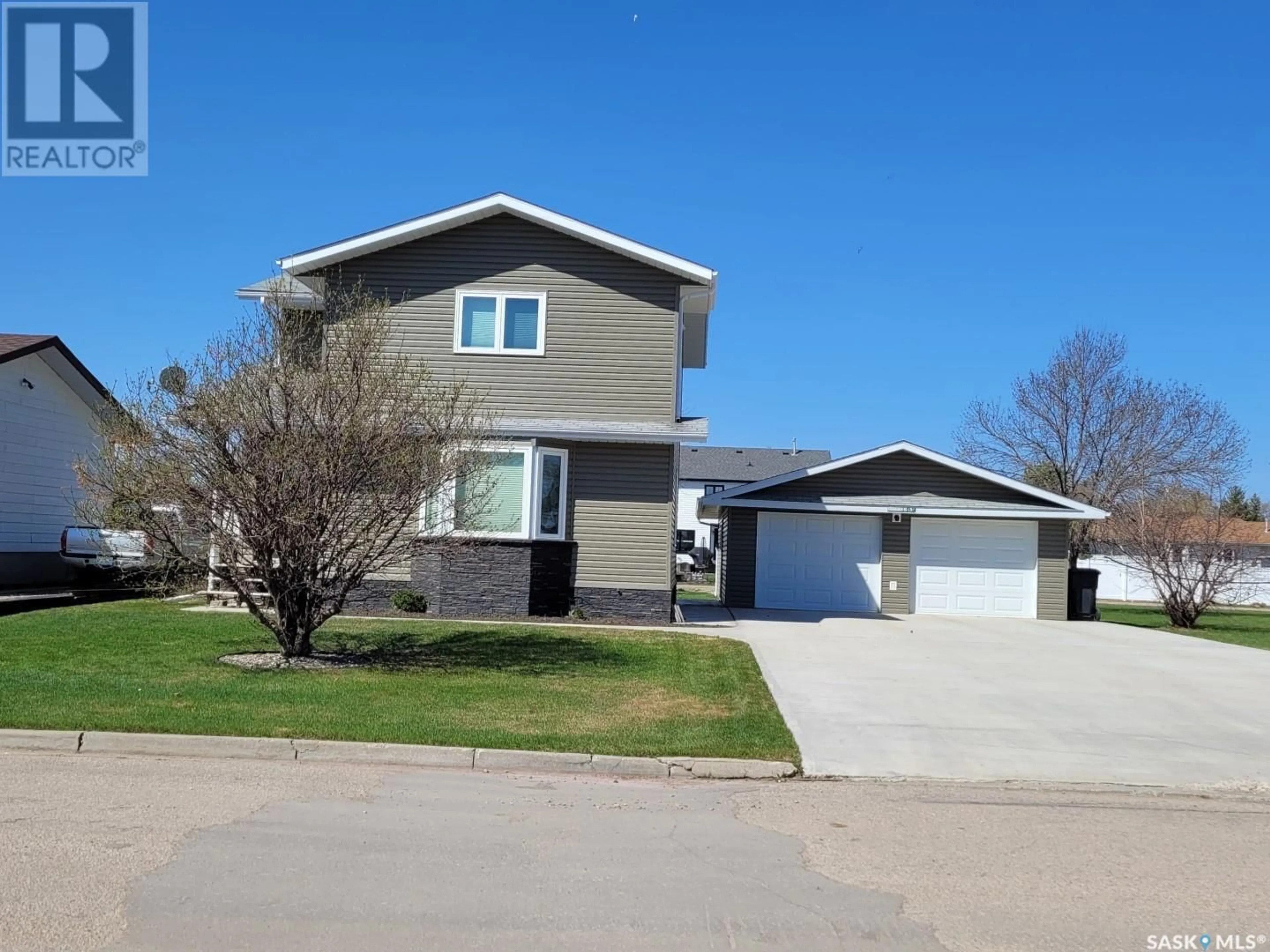 Home with vinyl exterior material, street for 3320 3RD STREET, Carrot River Saskatchewan S0E0L0