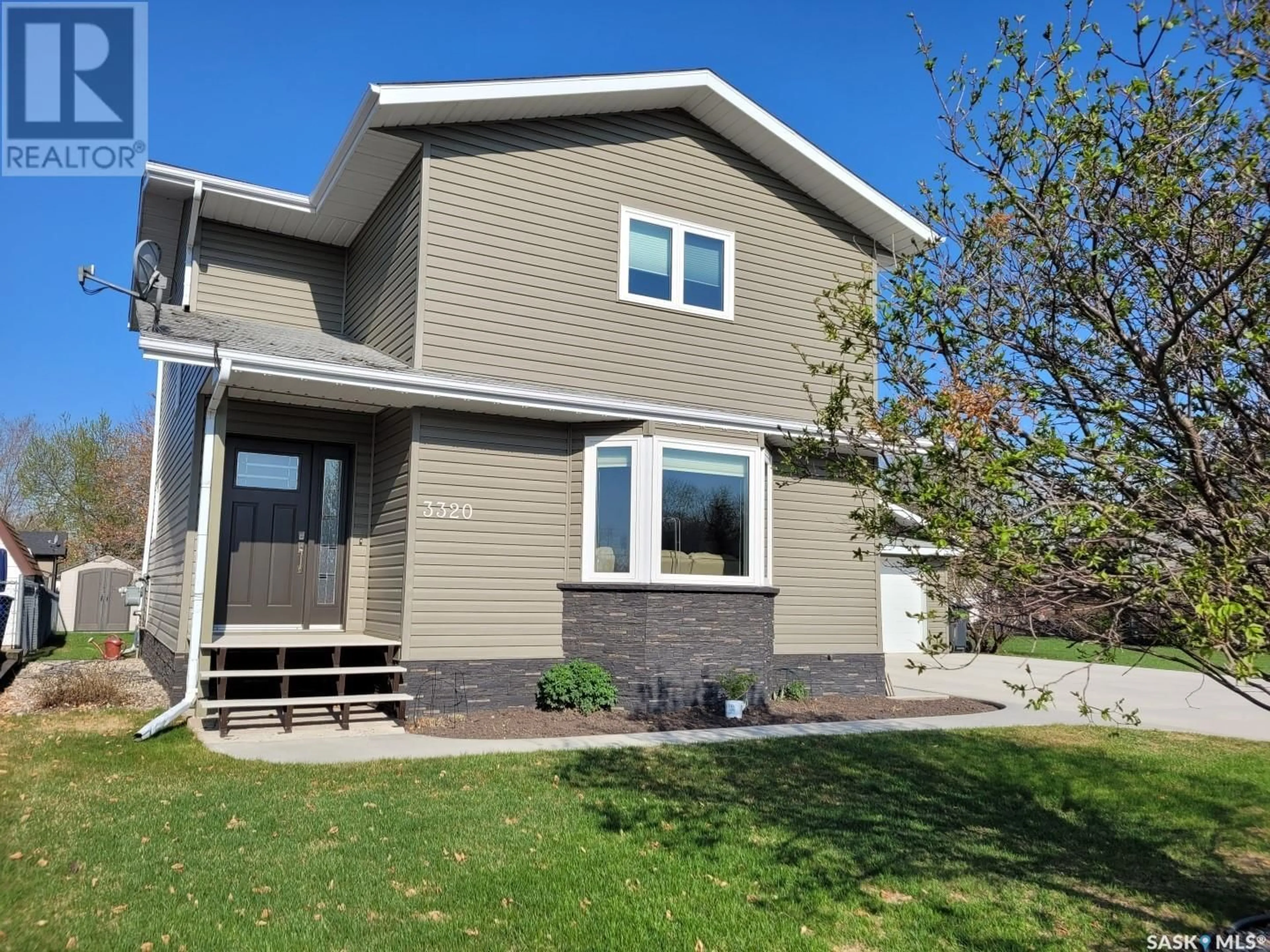 Home with vinyl exterior material, street for 3320 3RD STREET, Carrot River Saskatchewan S0E0L0