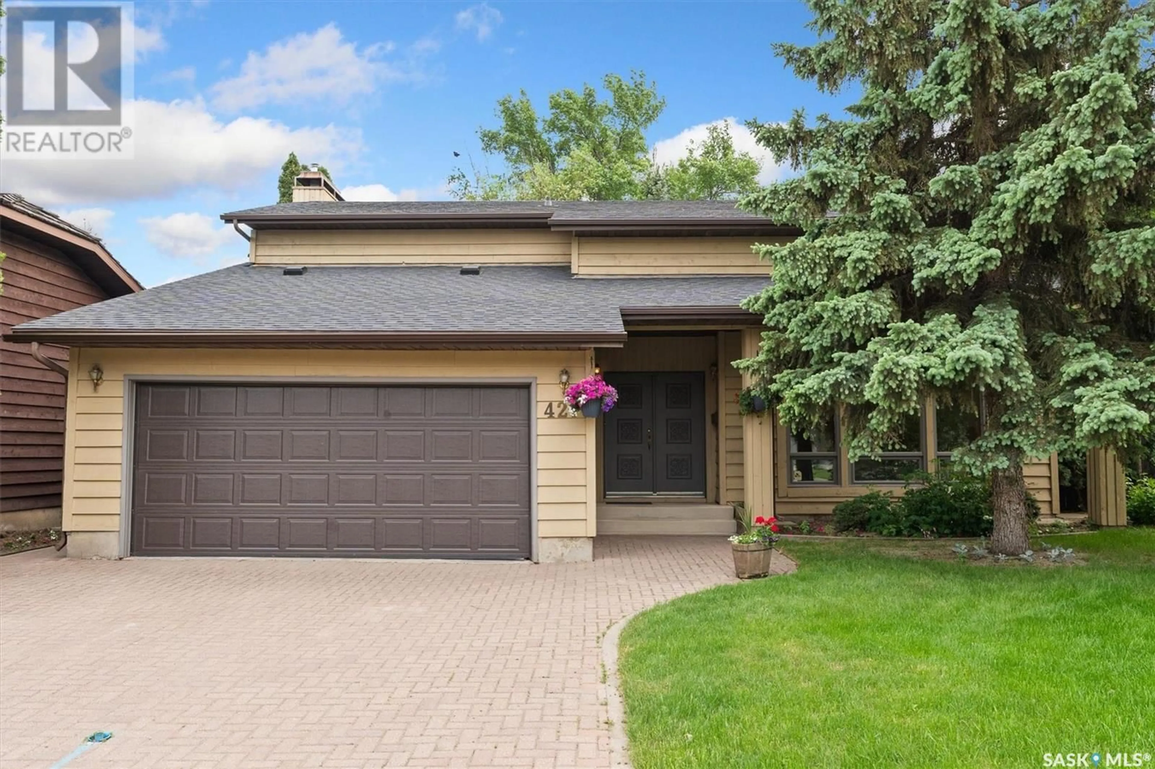 Home with brick exterior material, street for 427 LAKESHORE BAY, Saskatoon Saskatchewan S7J3T5