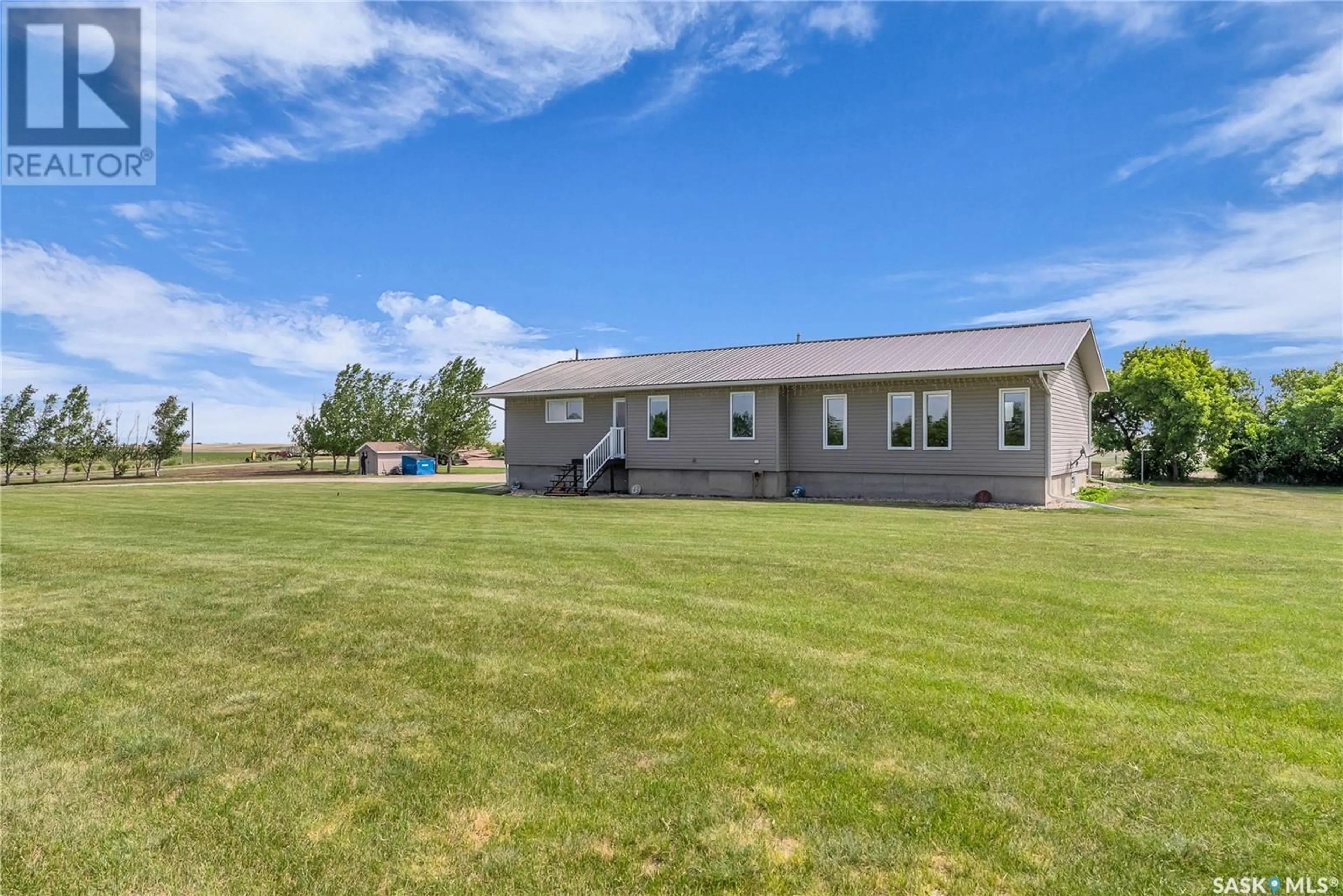 A pic from outside/outdoor area/front of a property/back of a property/a pic from drone, unknown for PRITCHARD ACREAGE, Morris Rm No. 312 Saskatchewan S0K0C0