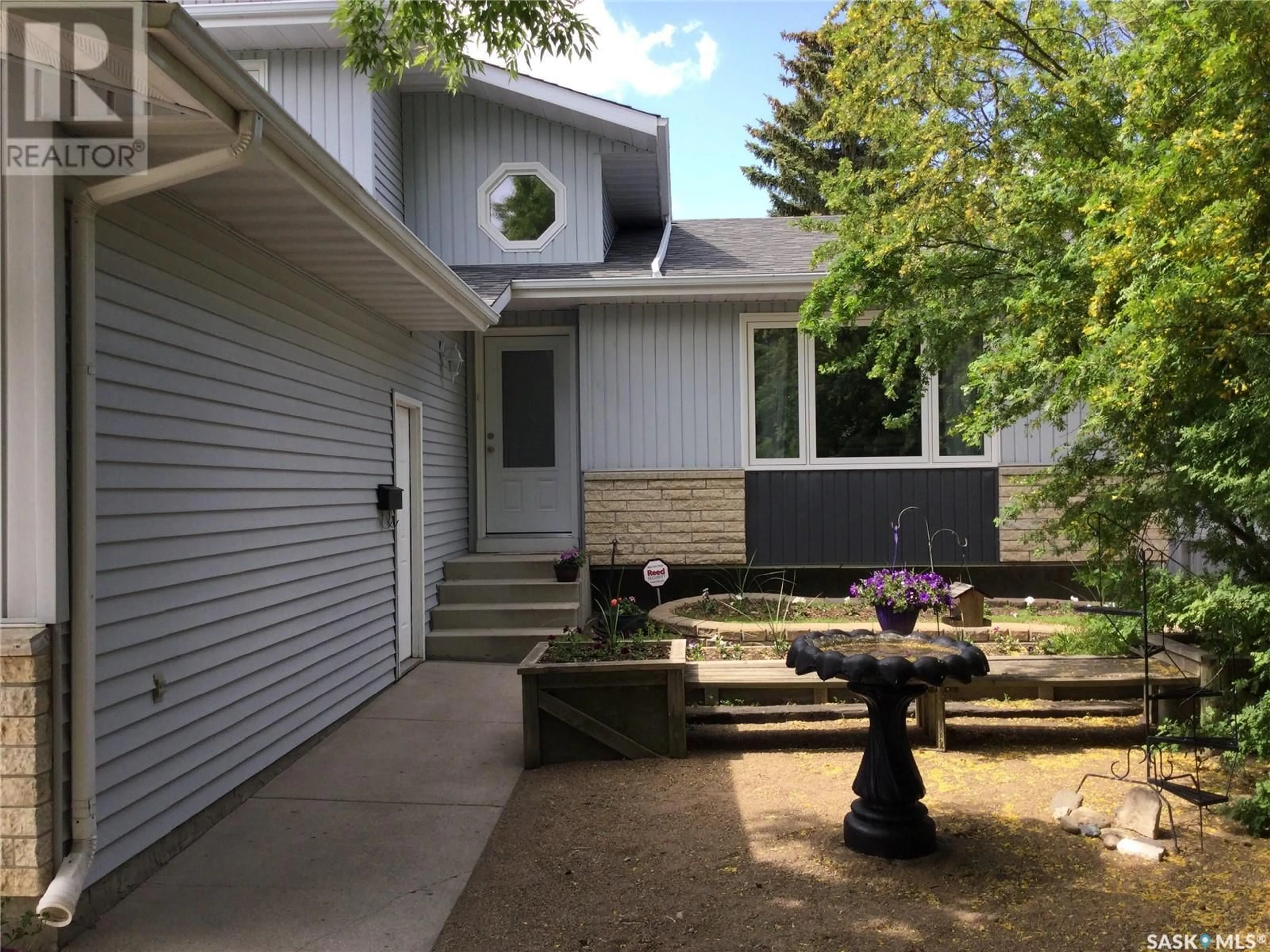 Home with vinyl exterior material, street for 117 9TH AVENUE, Warman Saskatchewan S0K4S0