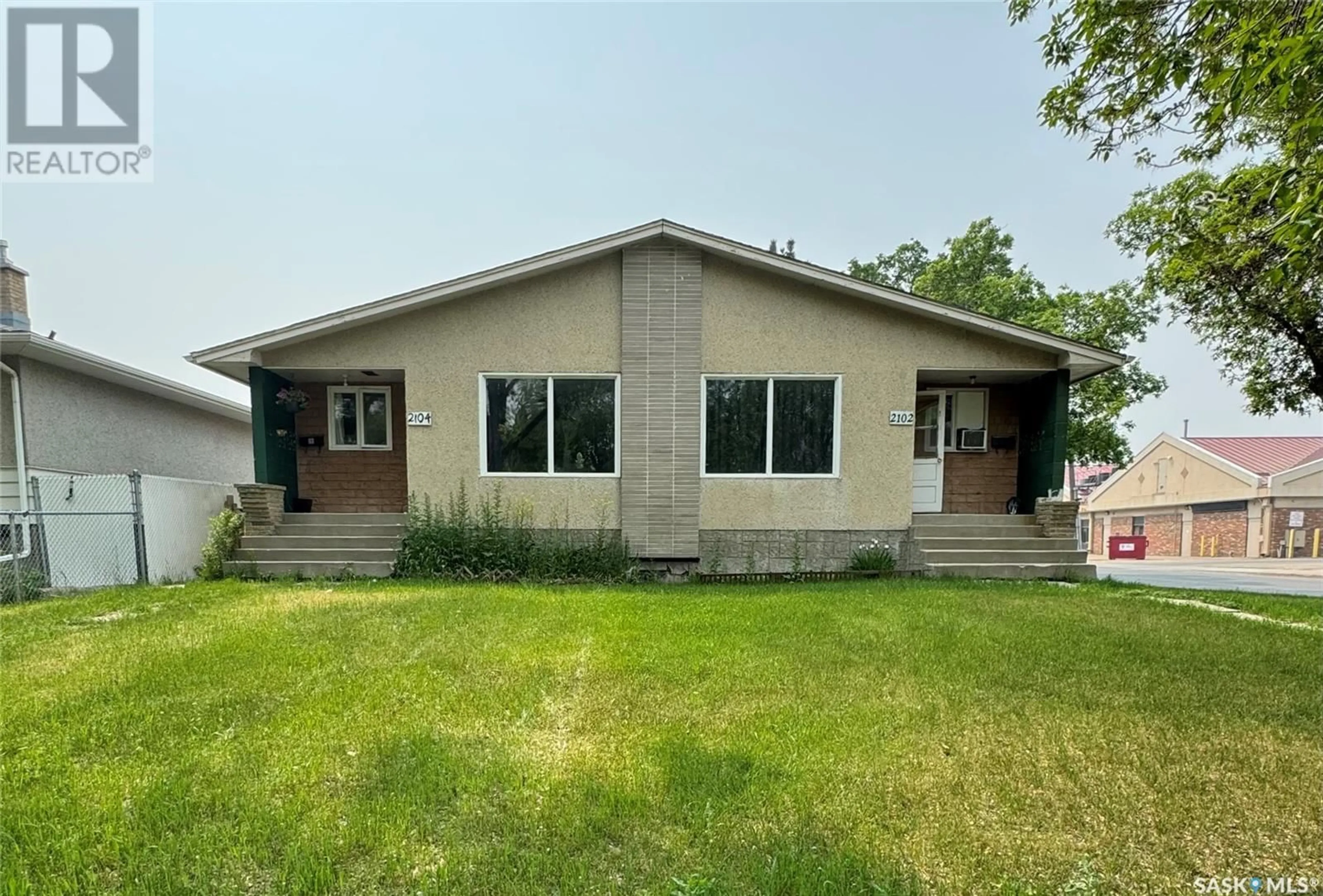 Home with vinyl exterior material, building for 2102-2104 ROTHWELL STREET, Regina Saskatchewan S4N2C4