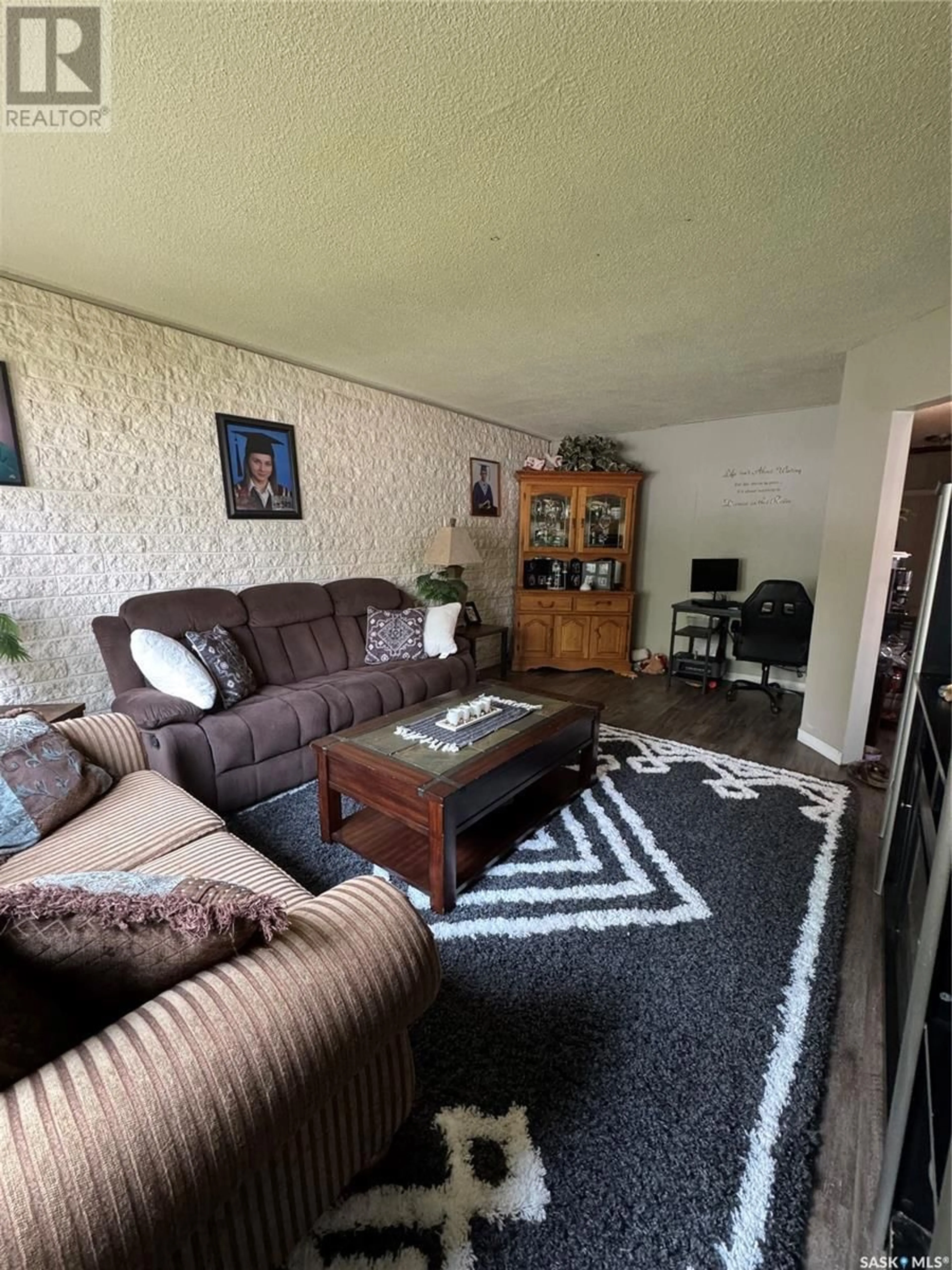 Living room with furniture, unknown for 2102-2104 ROTHWELL STREET, Regina Saskatchewan S4N2C4