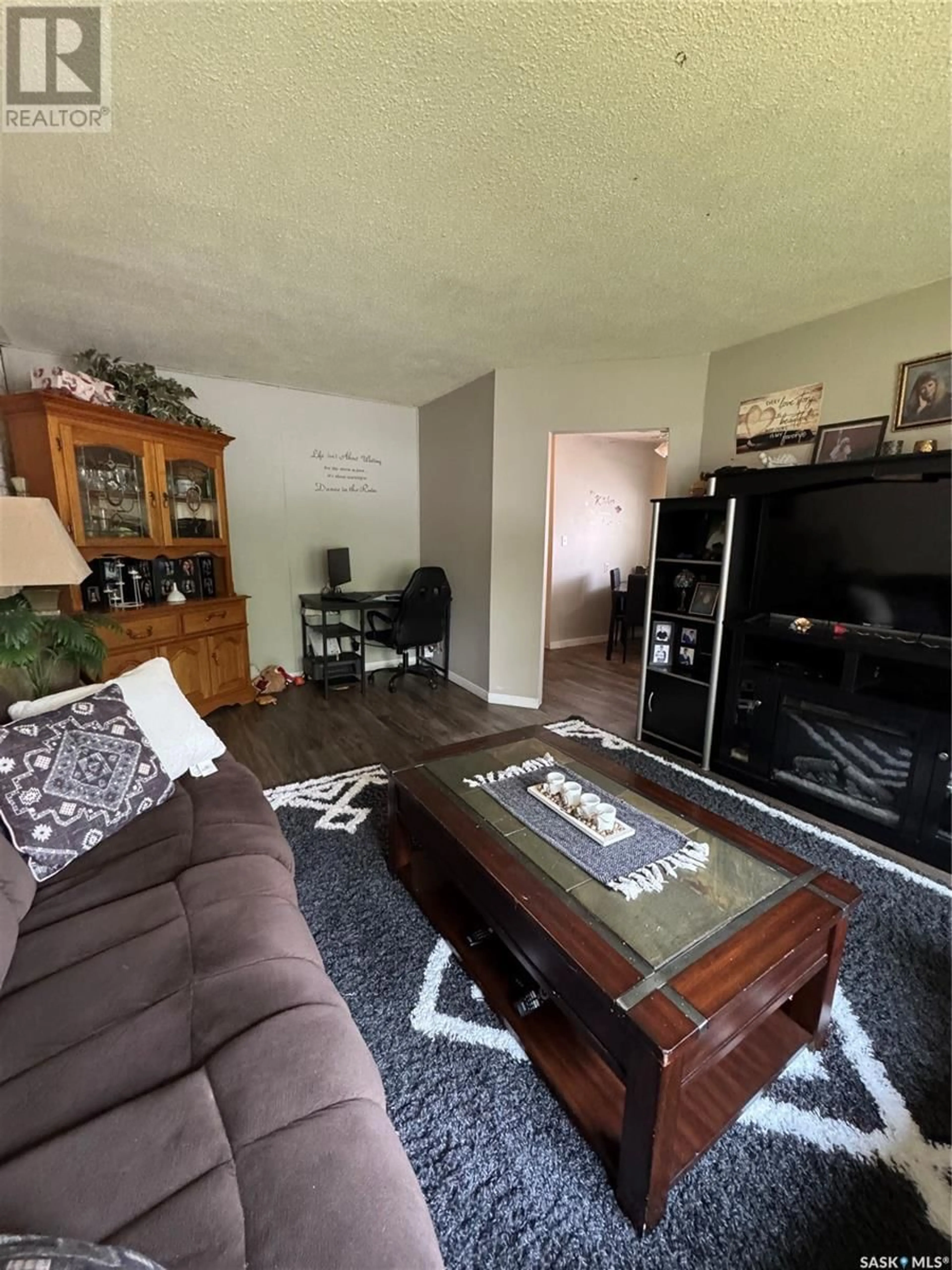 Living room with furniture, unknown for 2102-2104 ROTHWELL STREET, Regina Saskatchewan S4N2C4