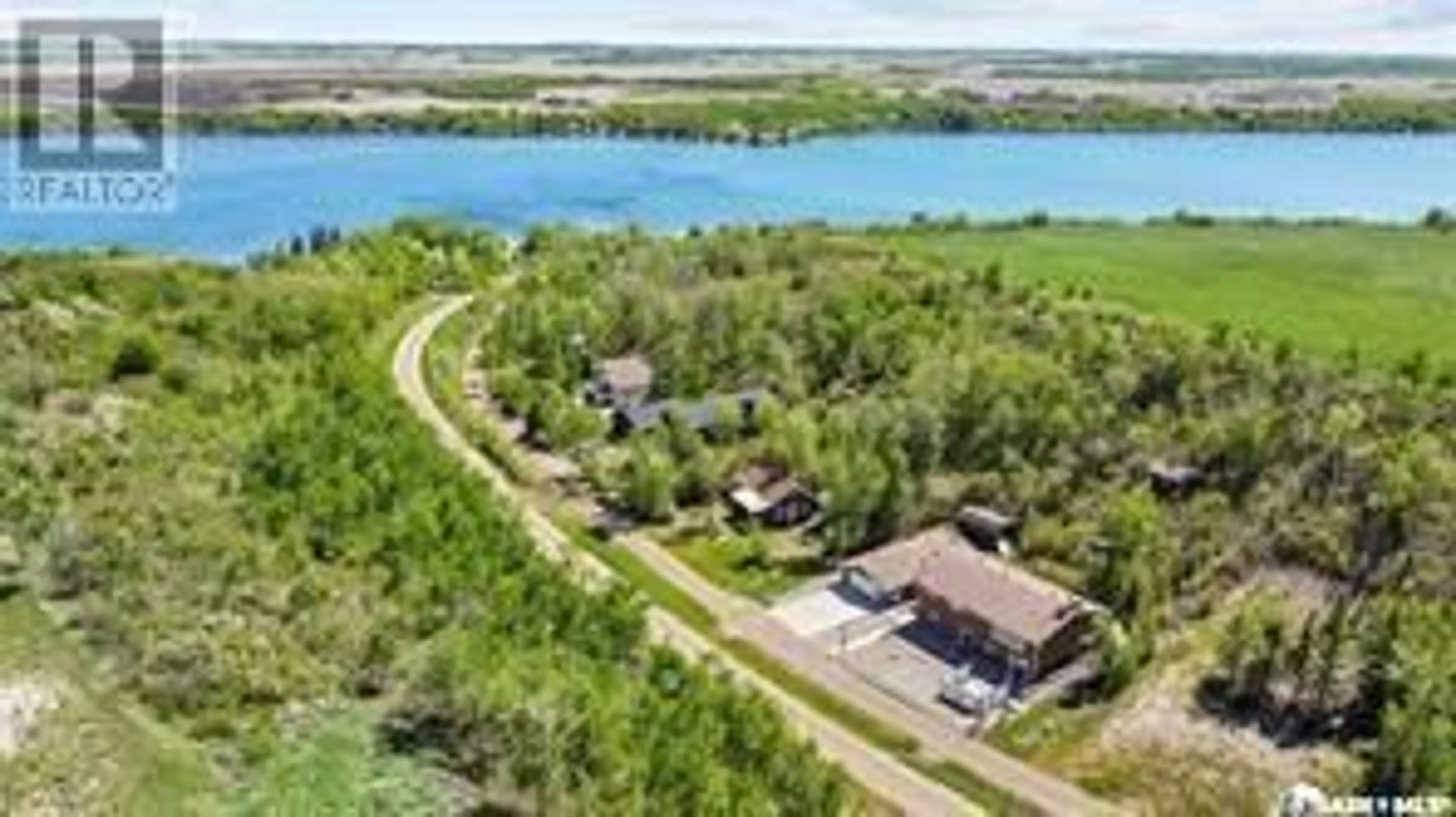A pic from outside/outdoor area/front of a property/back of a property/a pic from drone, water/lake/river/ocean view for 3 DOMREMY BEACH, Wakaw Lake Saskatchewan S0K4P0