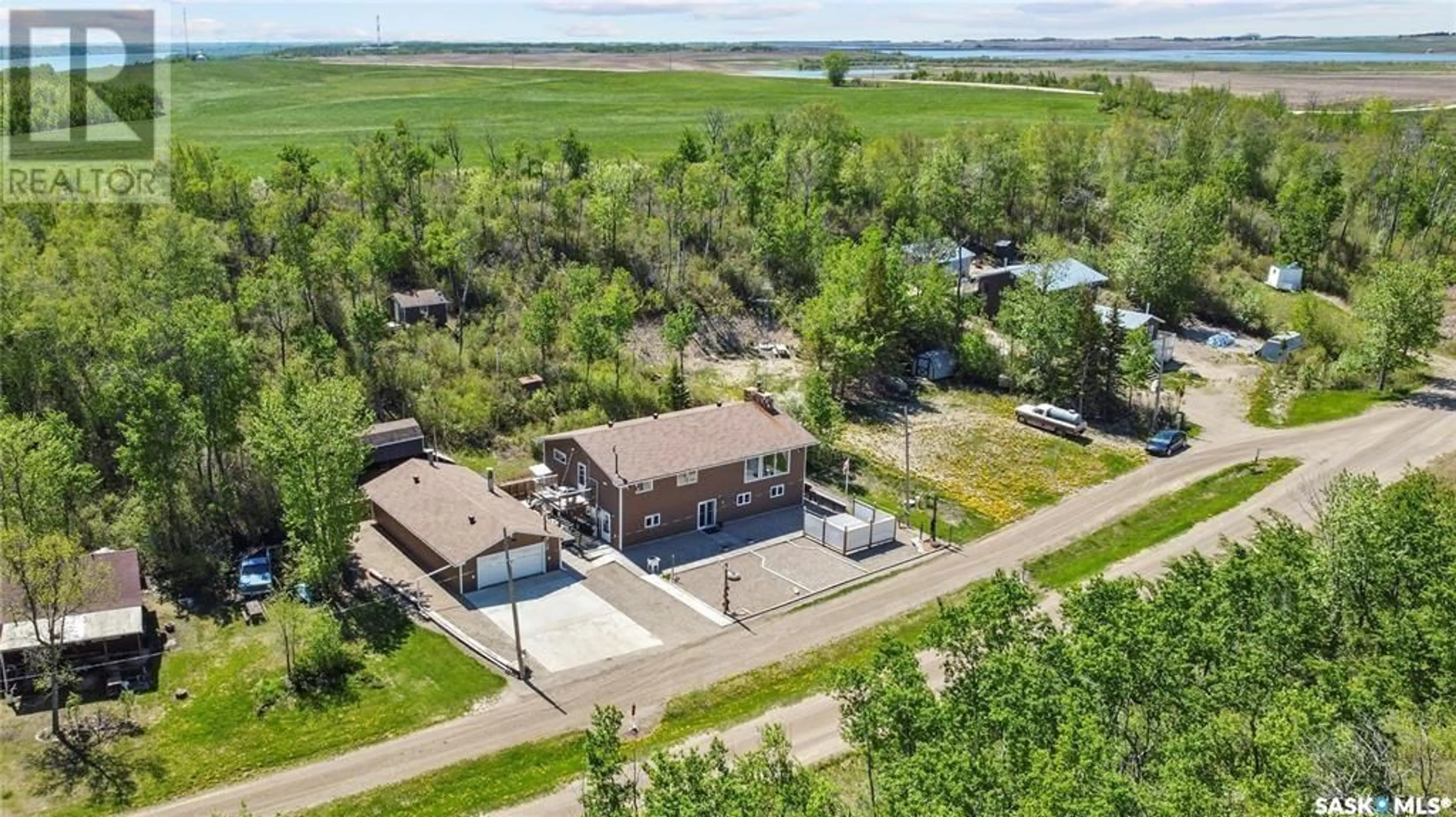 A pic from outside/outdoor area/front of a property/back of a property/a pic from drone, water/lake/river/ocean view for 3 DOMREMY BEACH, Wakaw Lake Saskatchewan S0K4P0