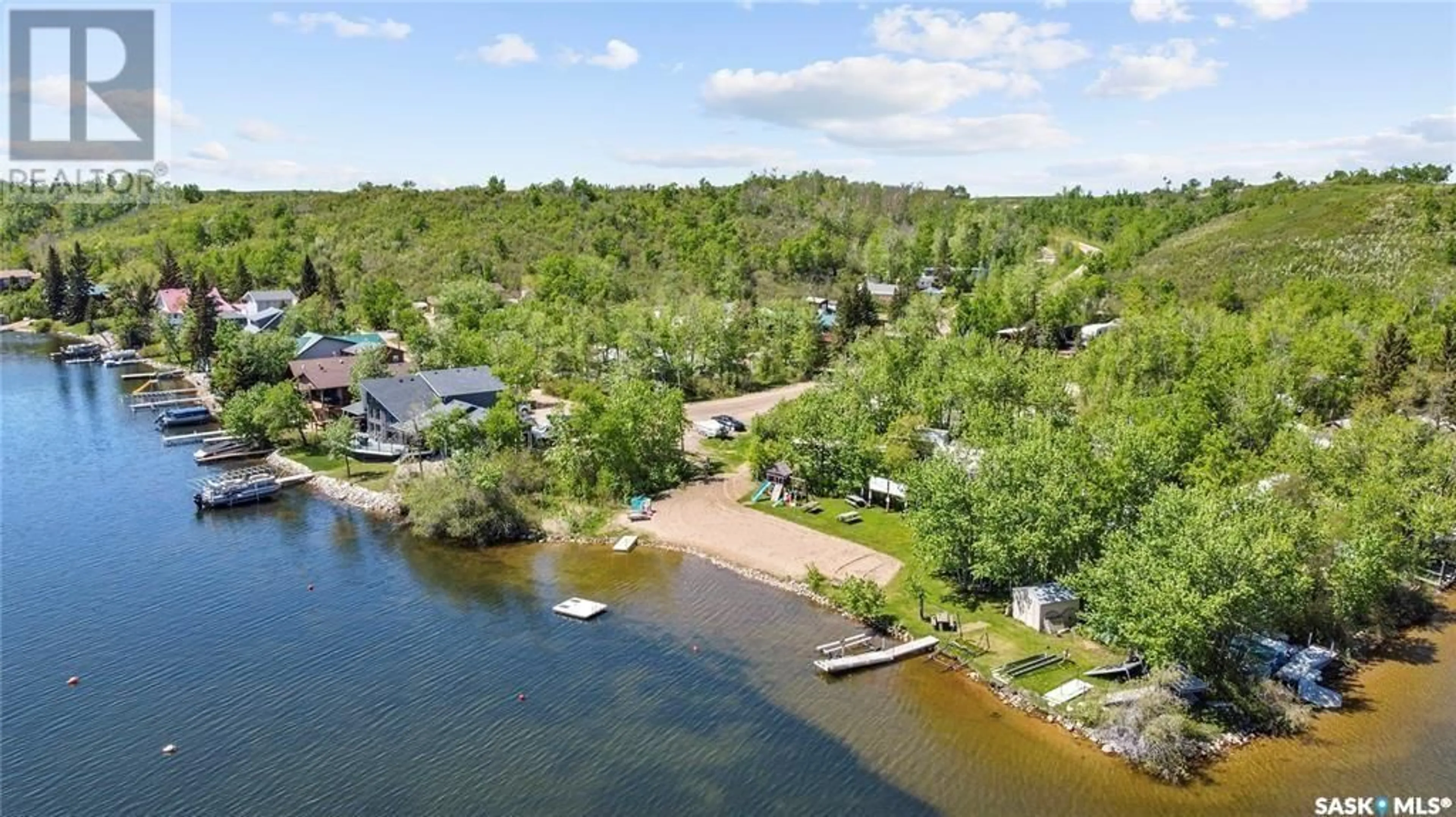 A pic from outside/outdoor area/front of a property/back of a property/a pic from drone, water/lake/river/ocean view for 3 DOMREMY BEACH, Wakaw Lake Saskatchewan S0K4P0