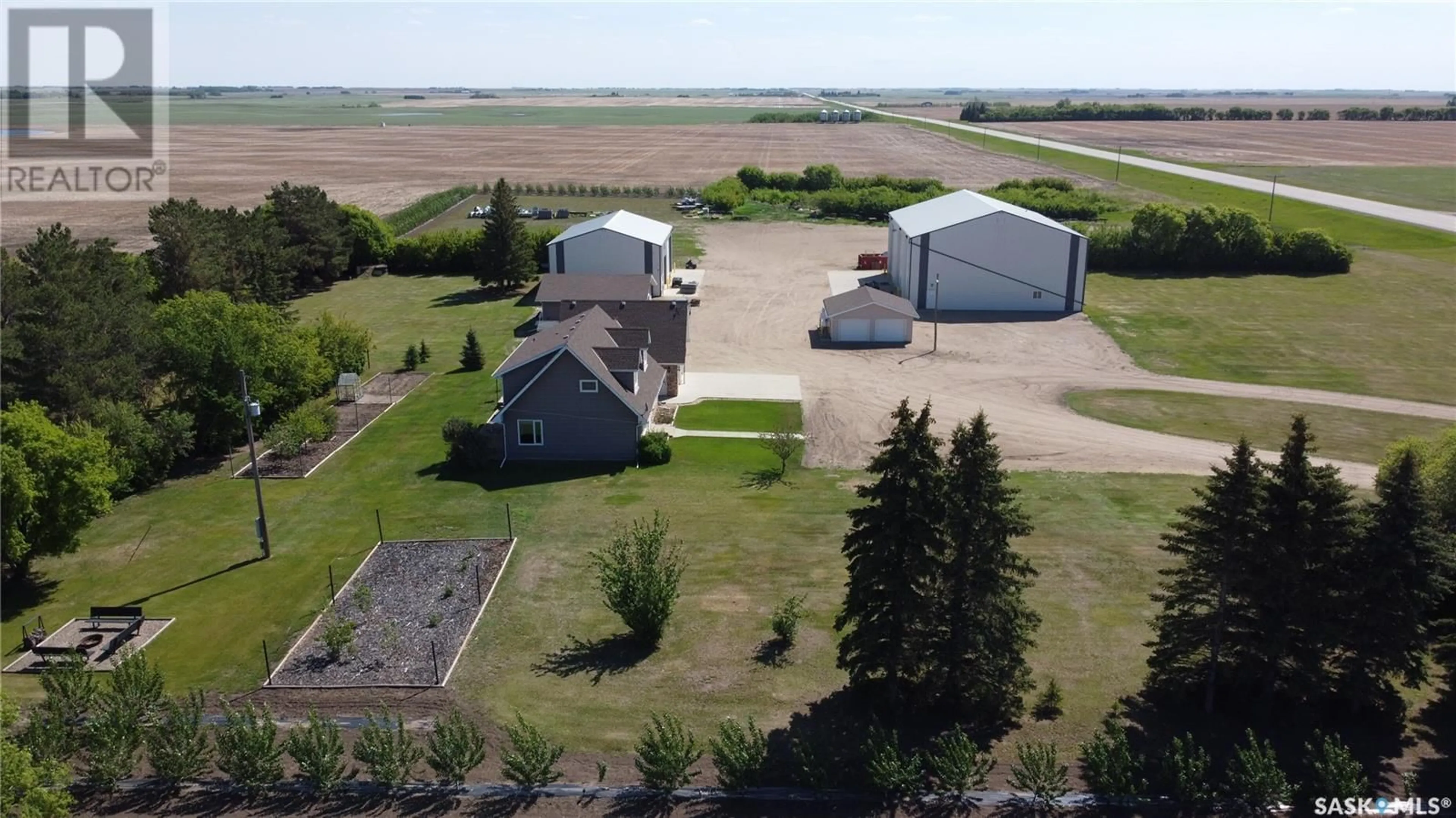 A pic from outside/outdoor area/front of a property/back of a property/a pic from drone, building for ROUND VALLEY ACREAGE, Round Valley Rm No. 410 Saskatchewan S0K4L0