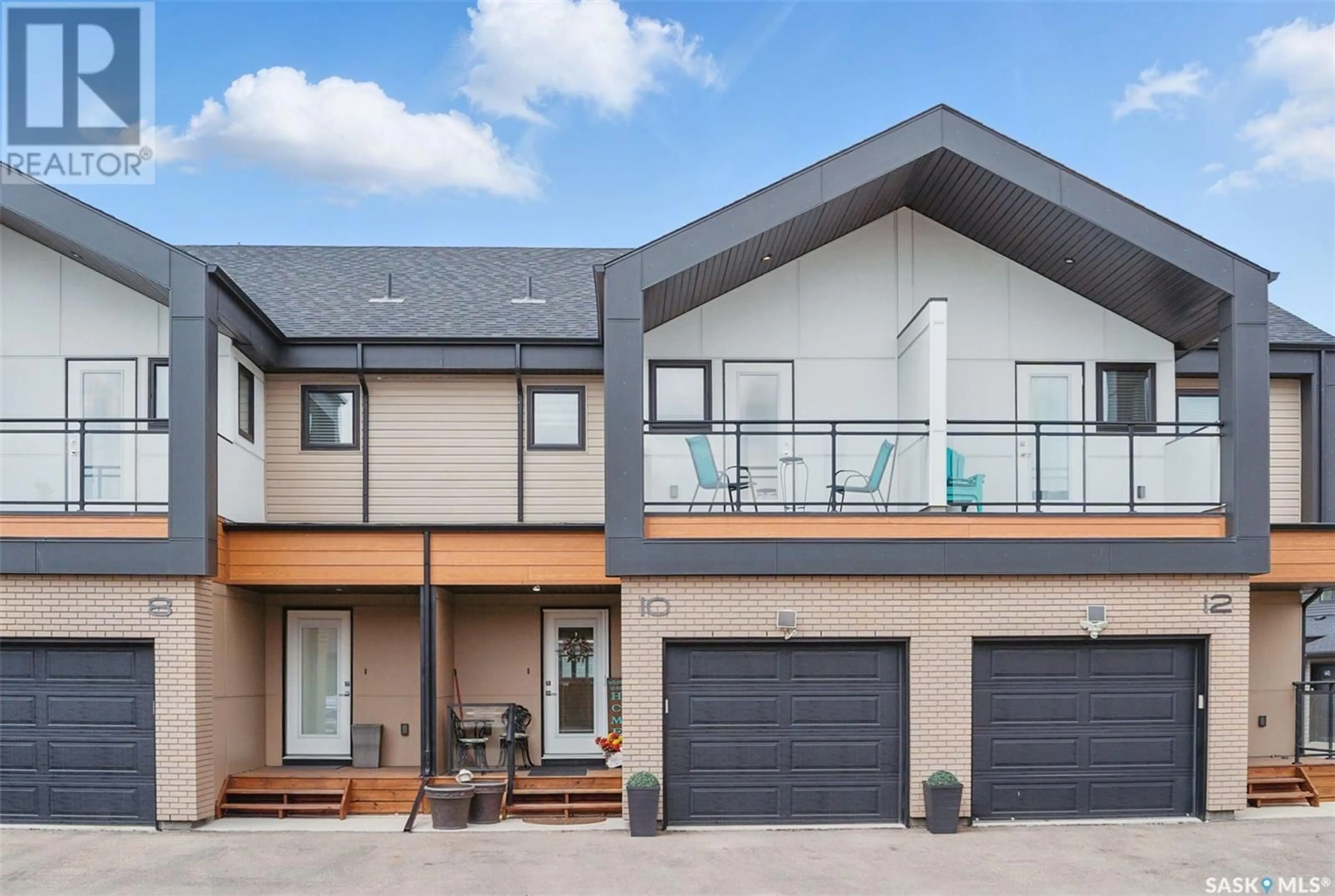 Home with brick exterior material, street for 10 619 EVERGREEN BOULEVARD, Saskatoon Saskatchewan S7W0Y7