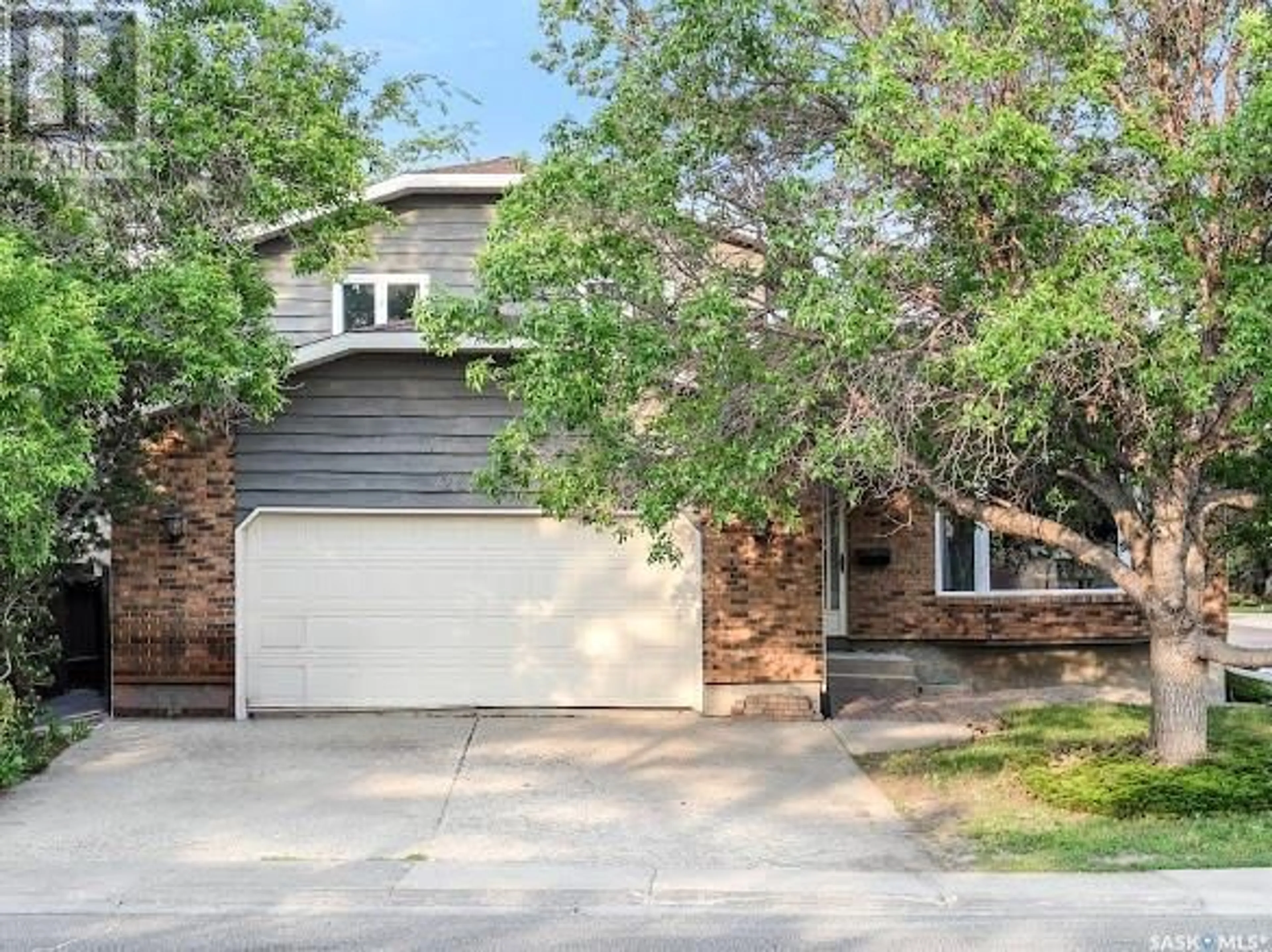 Home with brick exterior material, street for 2662 PHILIP ROAD, Regina Saskatchewan S4X2A9