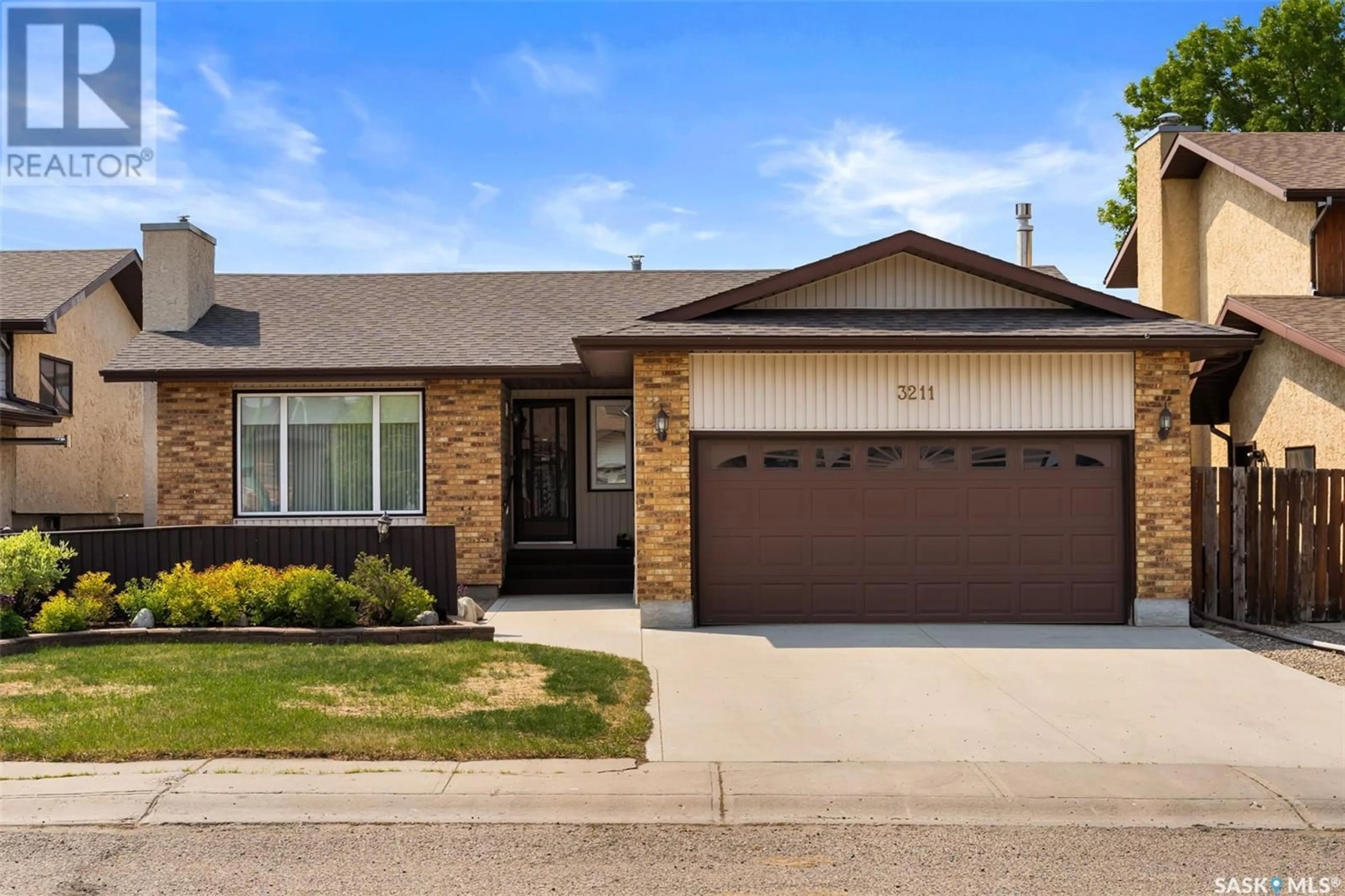 Home with brick exterior material, street for 3211 CARNEGIE STREET, Regina Saskatchewan S4R8J4