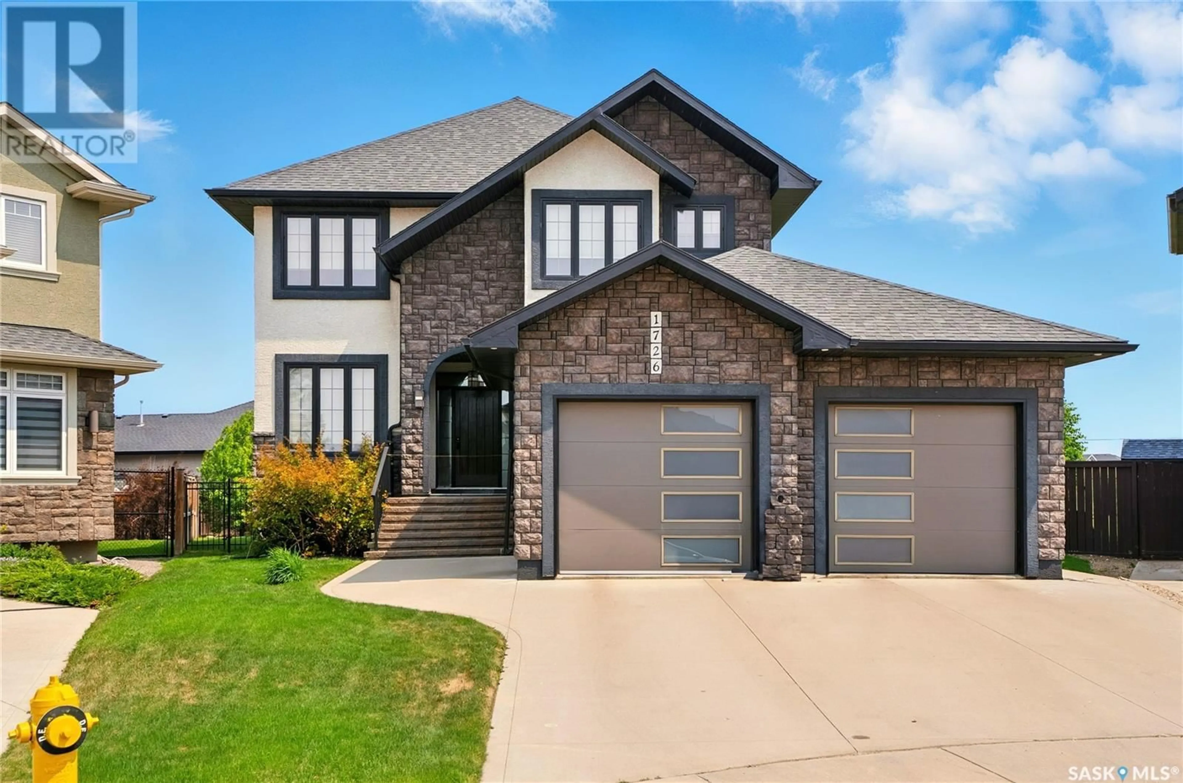 Home with brick exterior material, street for 1726 POHORECKY RISE, Saskatoon Saskatchewan S7W0J1