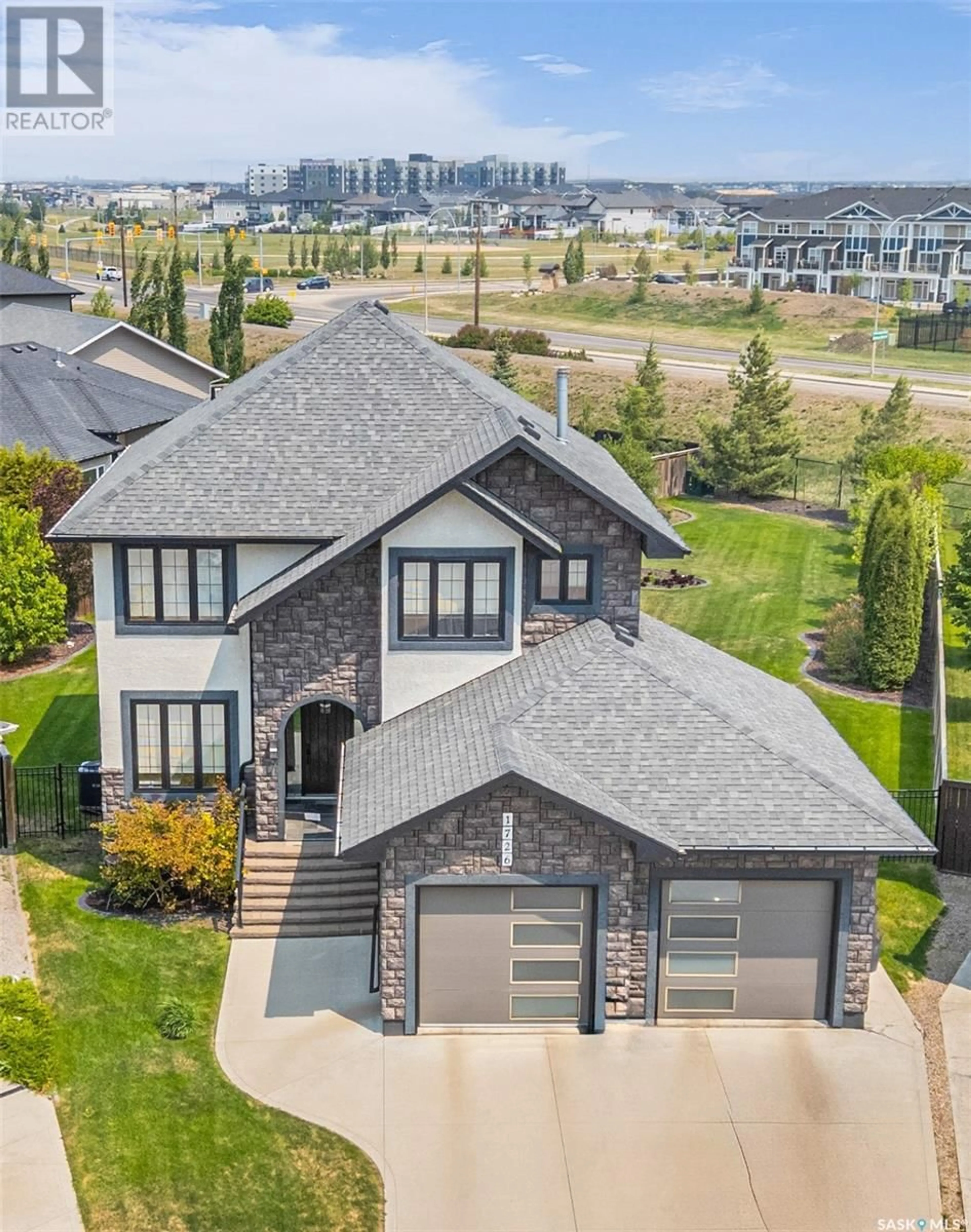 A pic from outside/outdoor area/front of a property/back of a property/a pic from drone, street for 1726 POHORECKY RISE, Saskatoon Saskatchewan S7W0J1