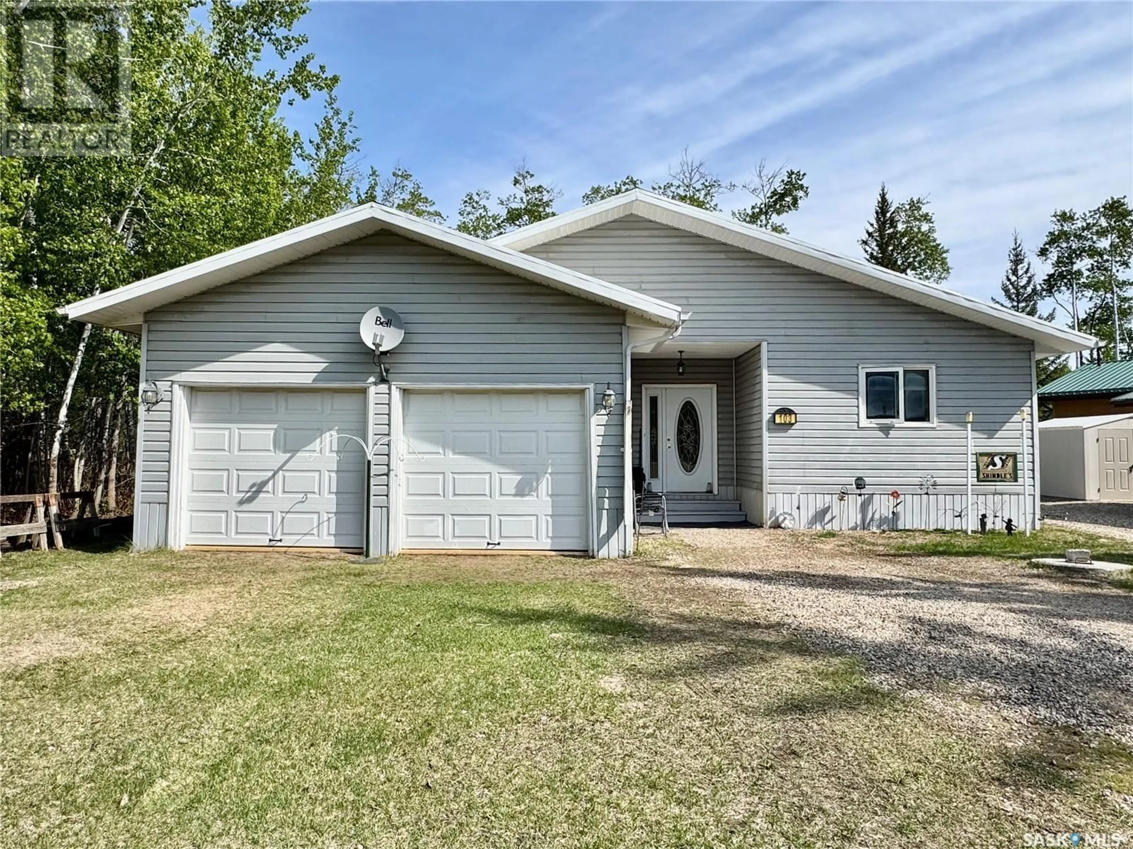 Home with vinyl exterior material, street for 103 MEADOW BROOK ROAD, Good Lake Rm No. 274 Saskatchewan S0A0L1
