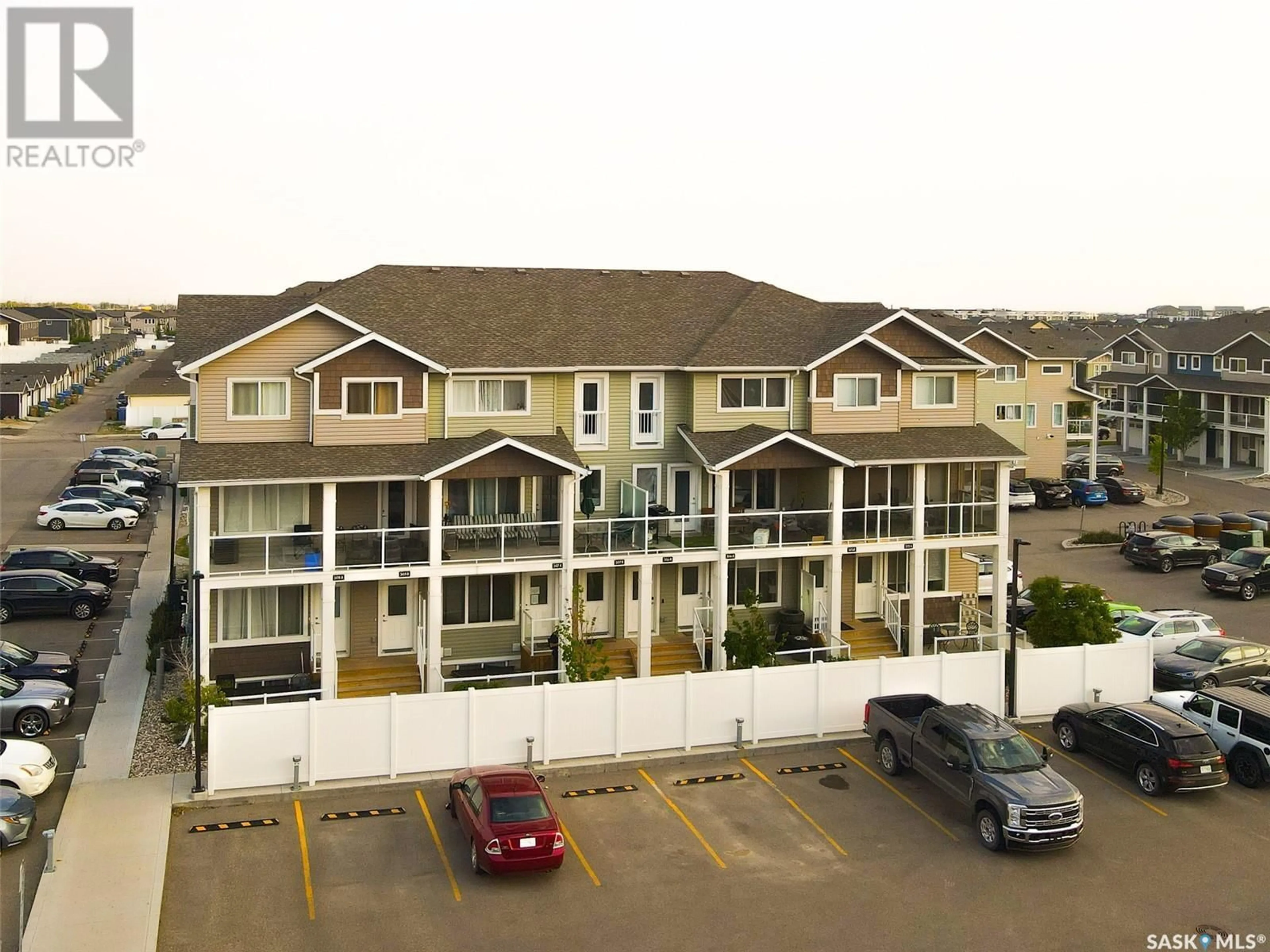 A pic from outside/outdoor area/front of a property/back of a property/a pic from drone, unknown for 307B - 3355 GREEN POPPY STREET, Regina Saskatchewan S4V3P6