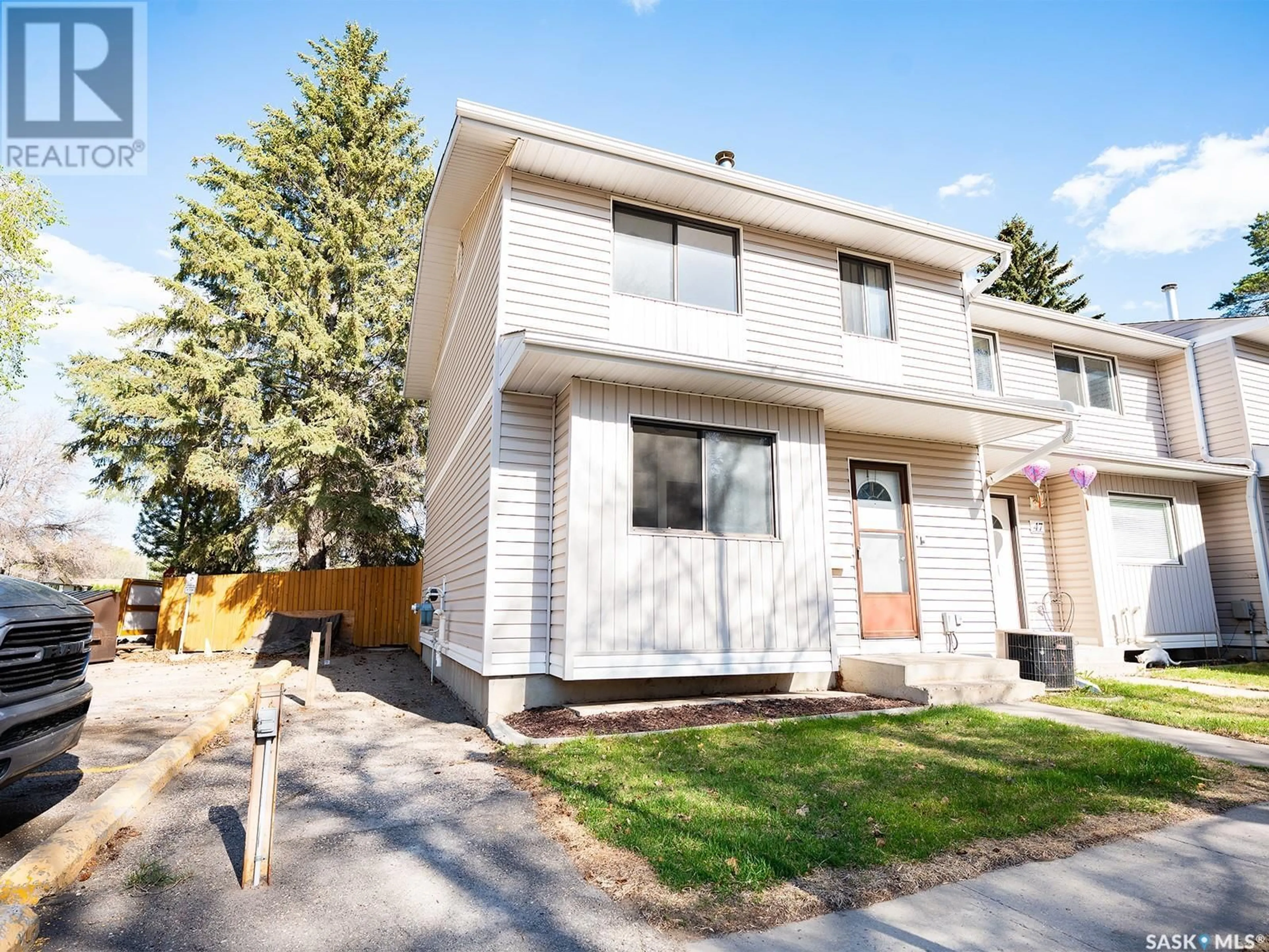 Home with vinyl exterior material, street for 46 330 HAIGHT CRESCENT, Saskatoon Saskatchewan S7H4V9