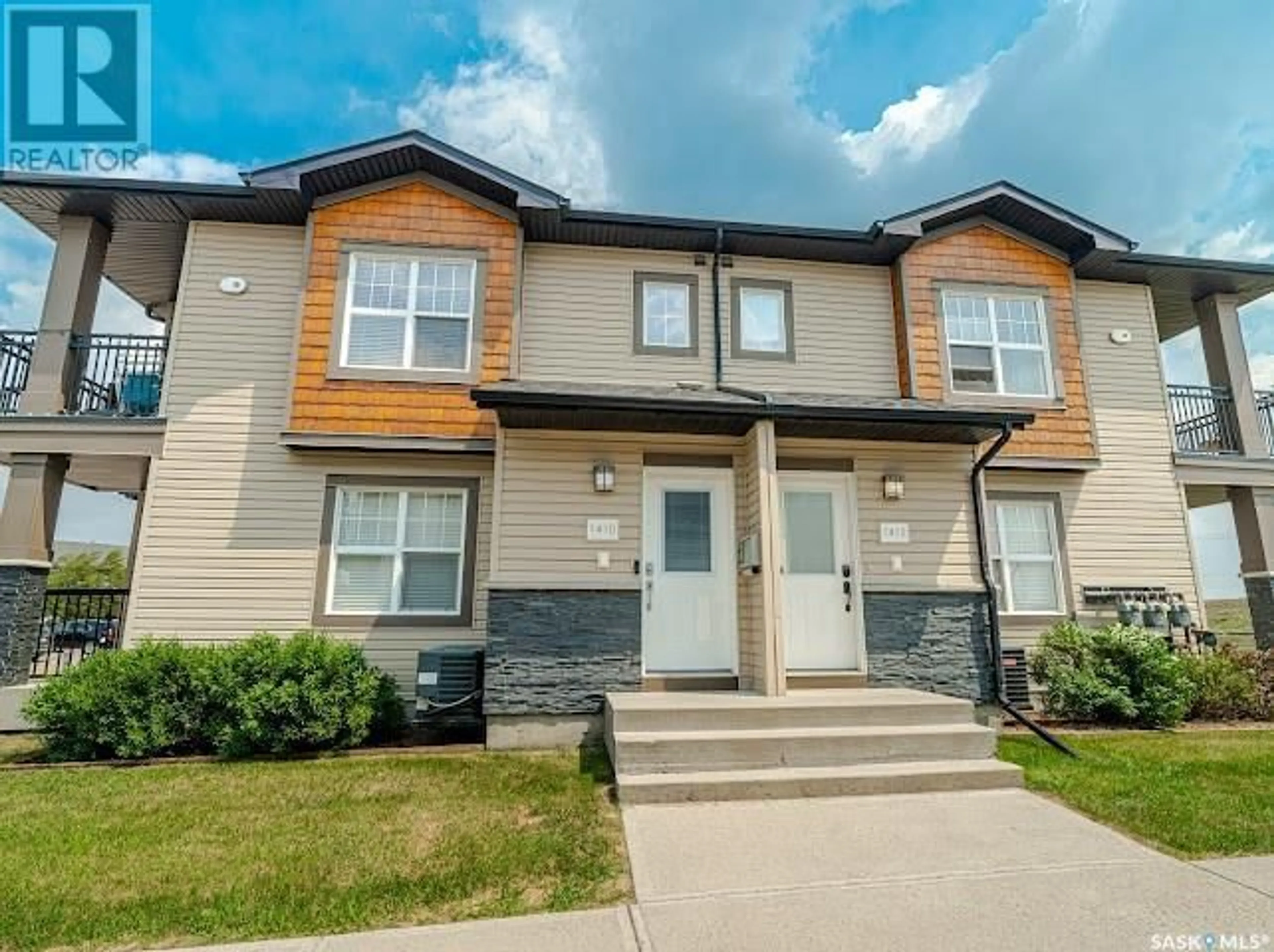 Home with vinyl exterior material, street for 1015 - 1410 PATRICK CRESCENT, Saskatoon Saskatchewan S7W0M5