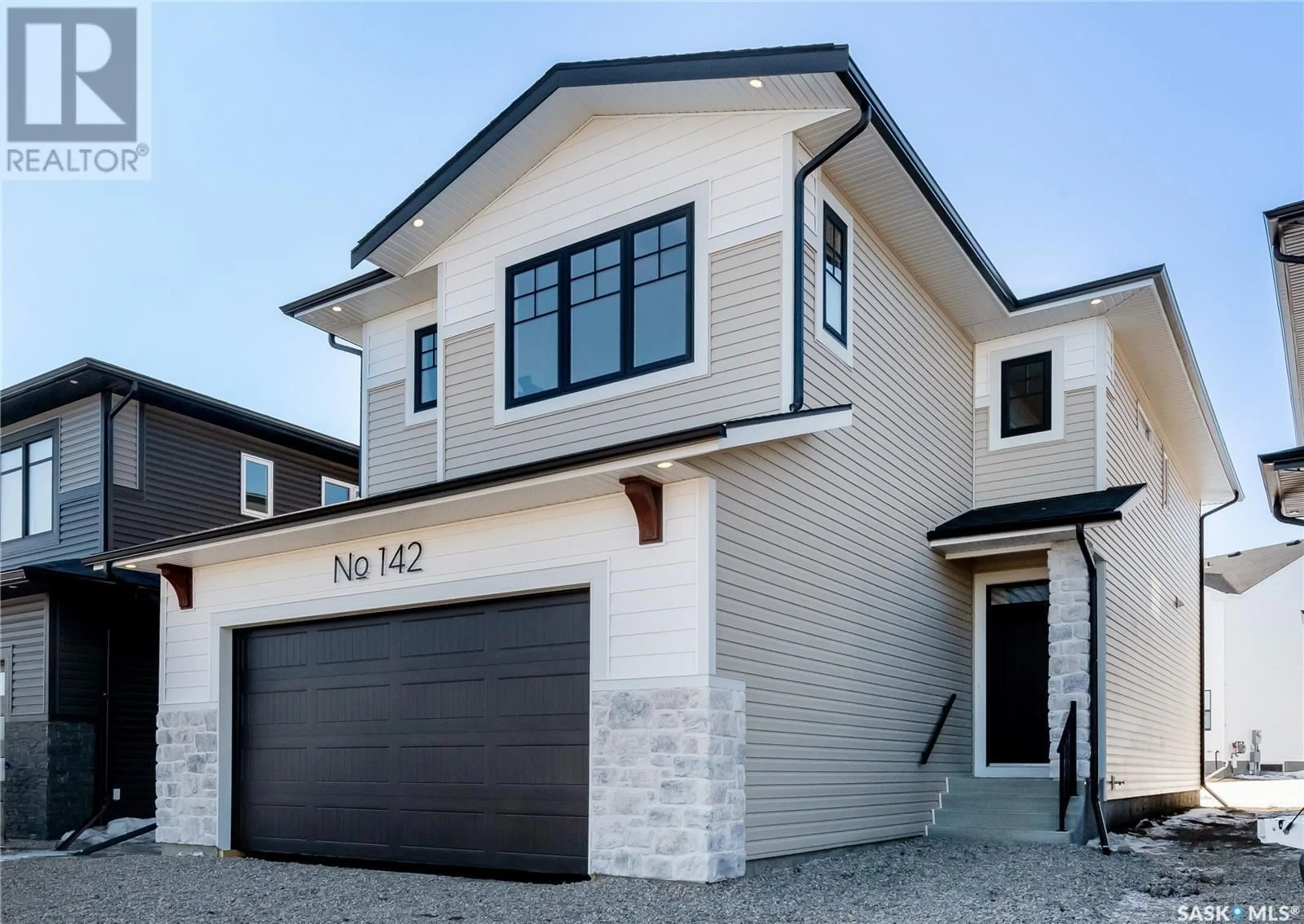 Home with brick exterior material, street for 147 COCKROFT MANOR, Saskatoon Saskatchewan S7V1Y4