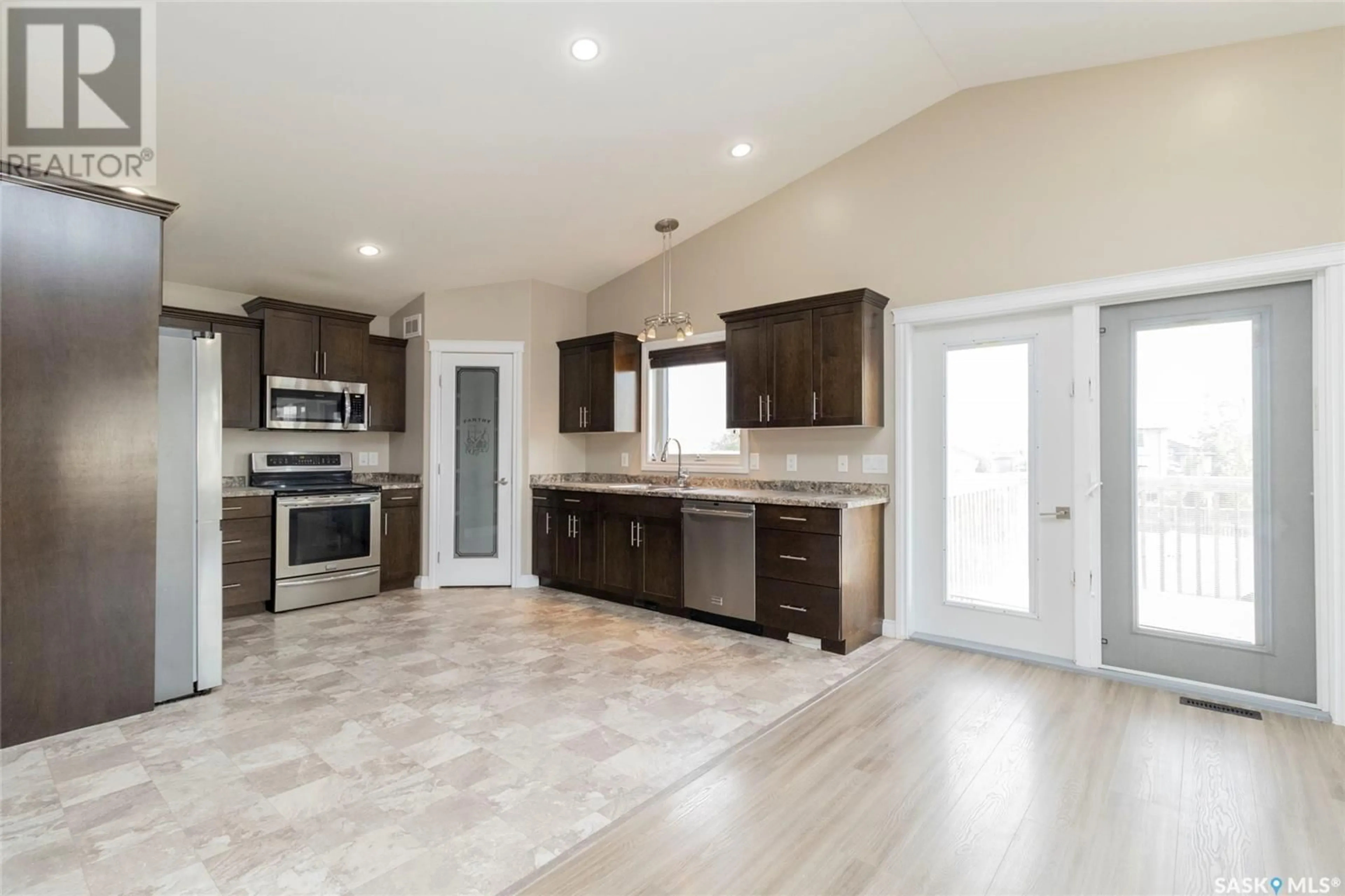 Open concept kitchen, ceramic/tile floor for 200 GLENWOOD TERRACE, Martensville Saskatchewan S0K0A2
