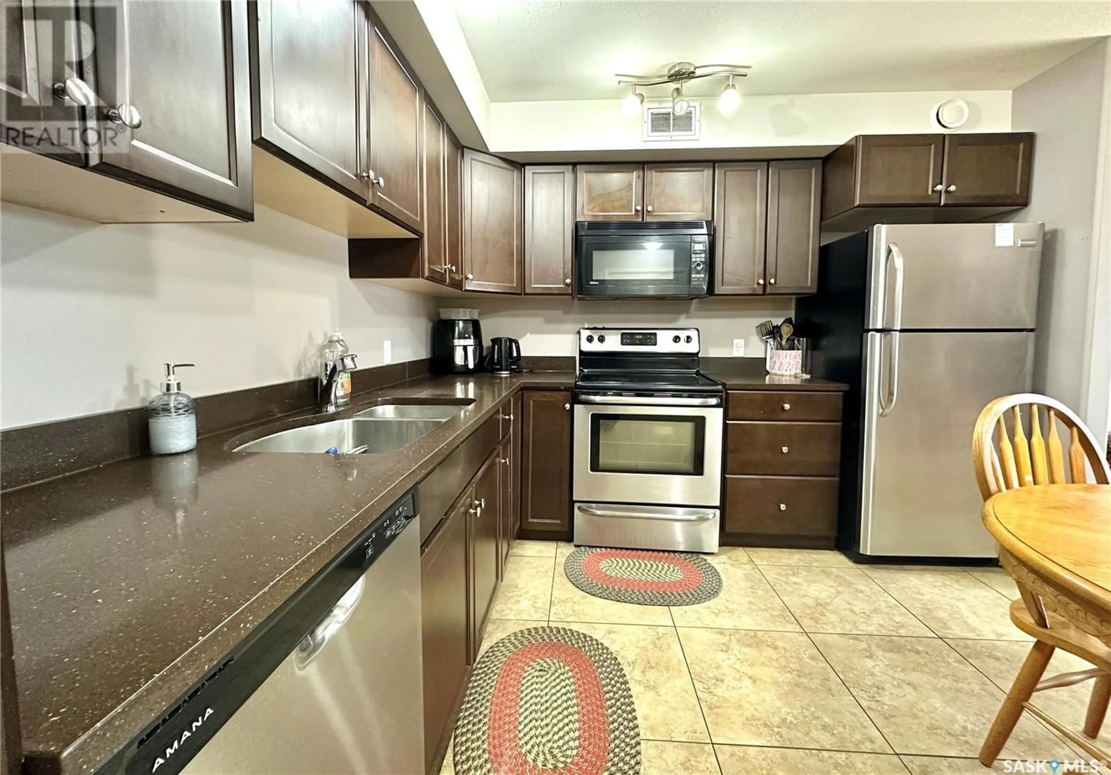 Standard kitchen, ceramic/tile floor for 104 - 2322 KILDEER DRIVE, North Battleford Saskatchewan S9A3T5