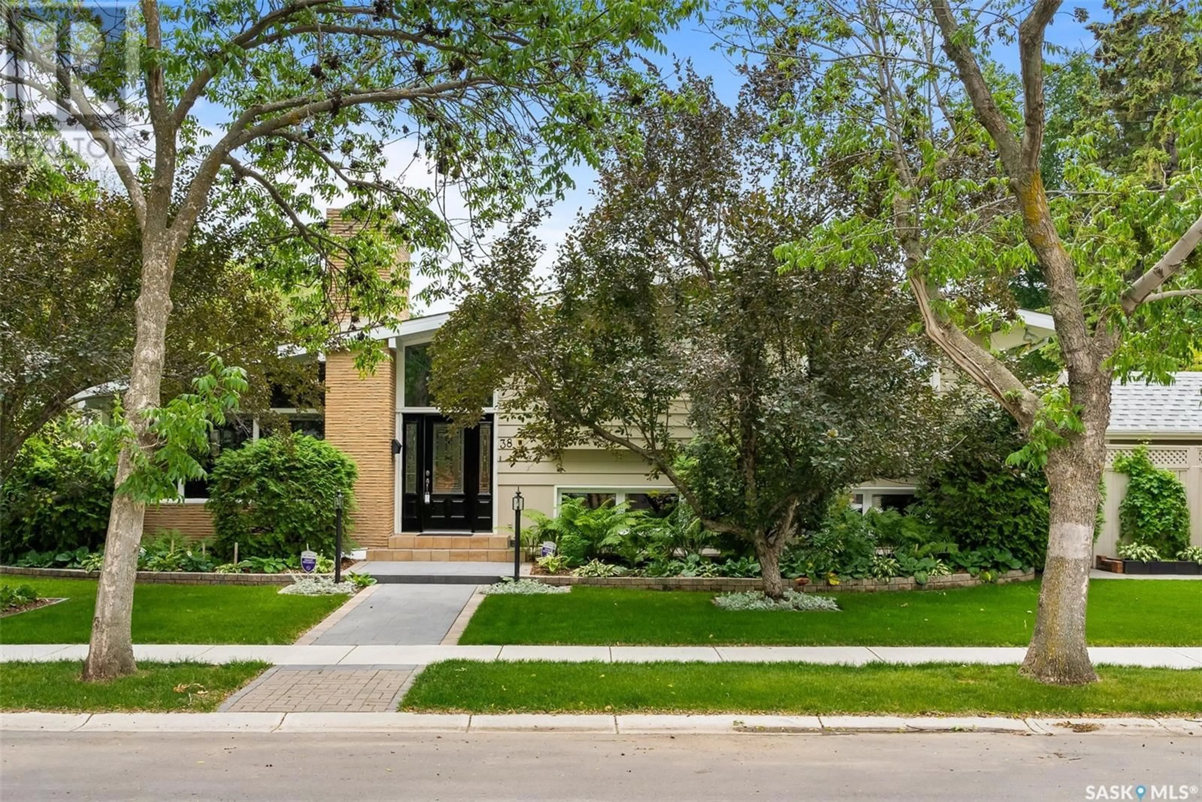 Home with brick exterior material, street for 38 CALDER CRESCENT, Regina Saskatchewan S4S4A6