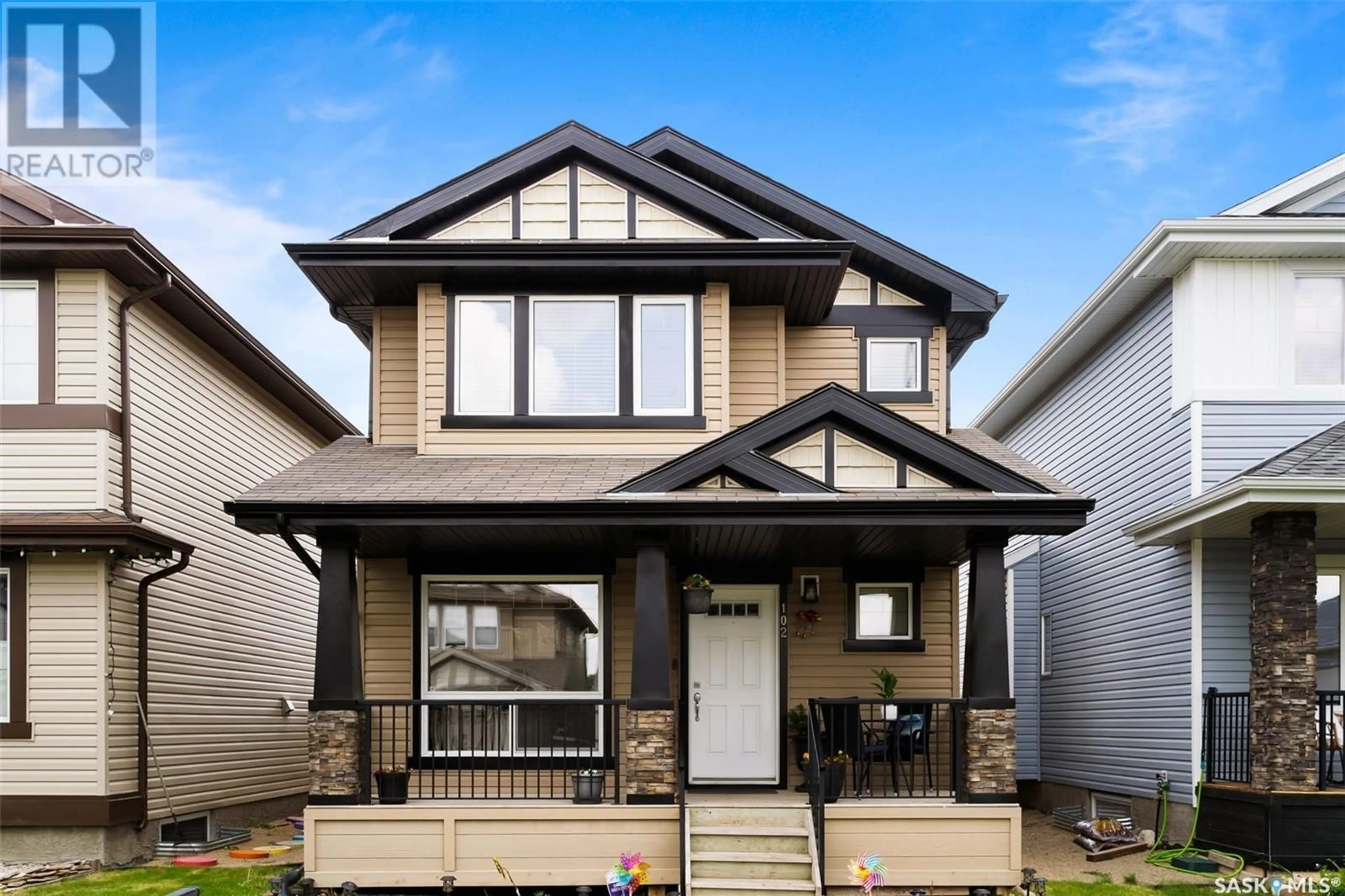 Home with vinyl exterior material, street for 102 POPLAR BLUFF CRESCENT, Regina Saskatchewan S4Y0B5