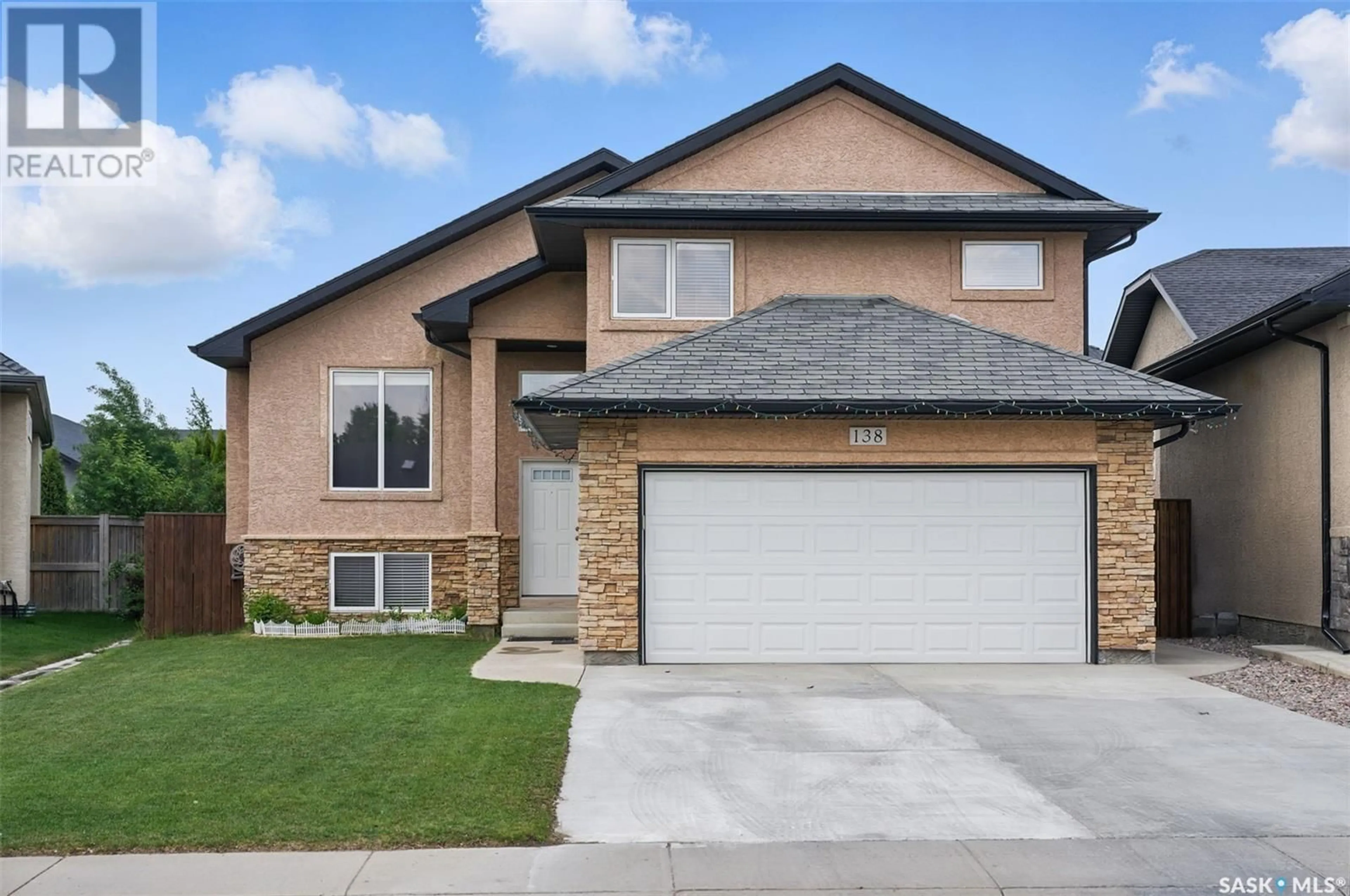 Home with brick exterior material, street for 138 ASSALY STREET, Saskatoon Saskatchewan S7T0E4