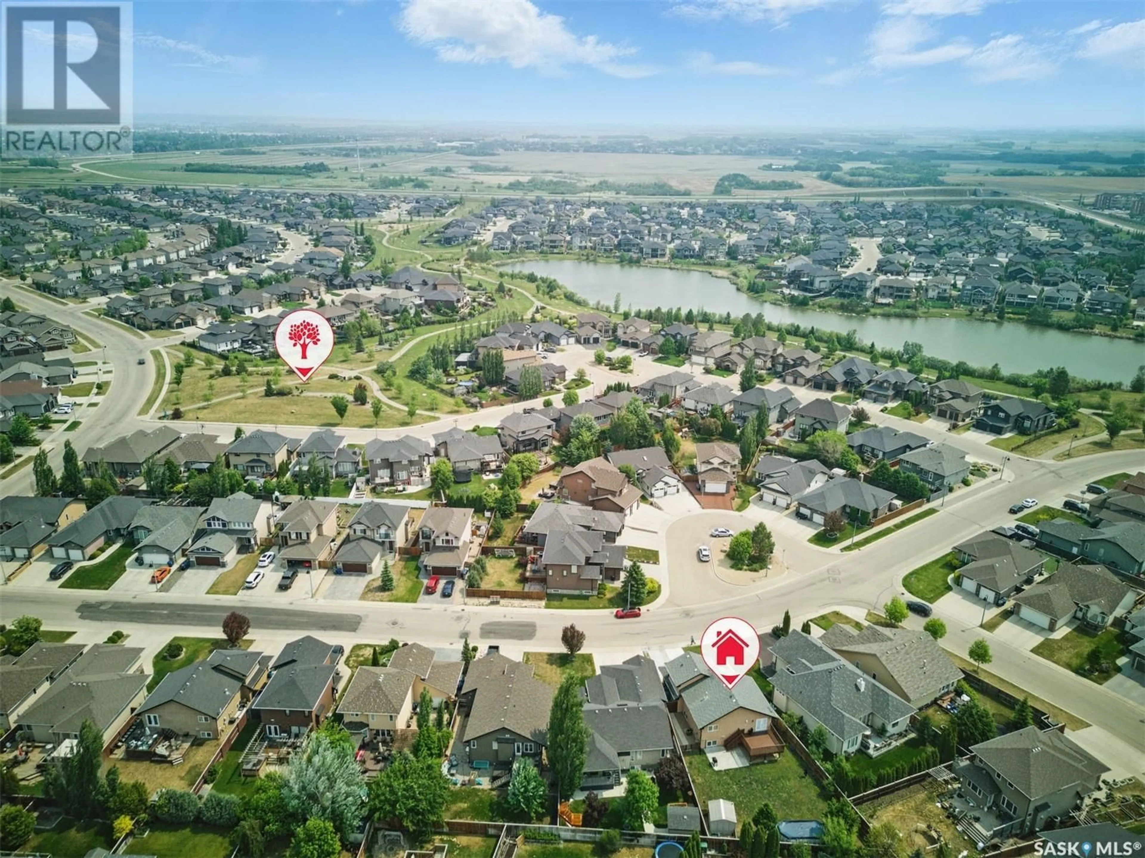A pic from outside/outdoor area/front of a property/back of a property/a pic from drone, water/lake/river/ocean view for 138 ASSALY STREET, Saskatoon Saskatchewan S7T0E4