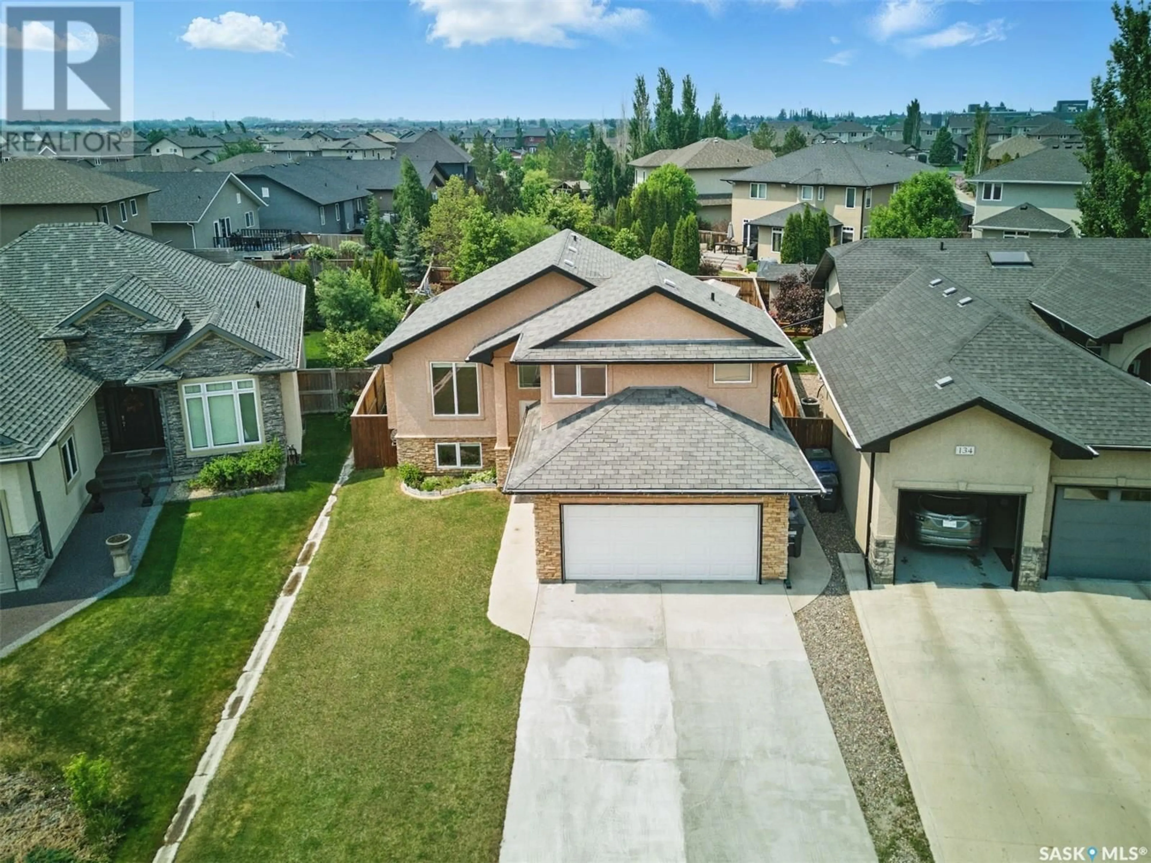 A pic from outside/outdoor area/front of a property/back of a property/a pic from drone, street for 138 ASSALY STREET, Saskatoon Saskatchewan S7T0E4