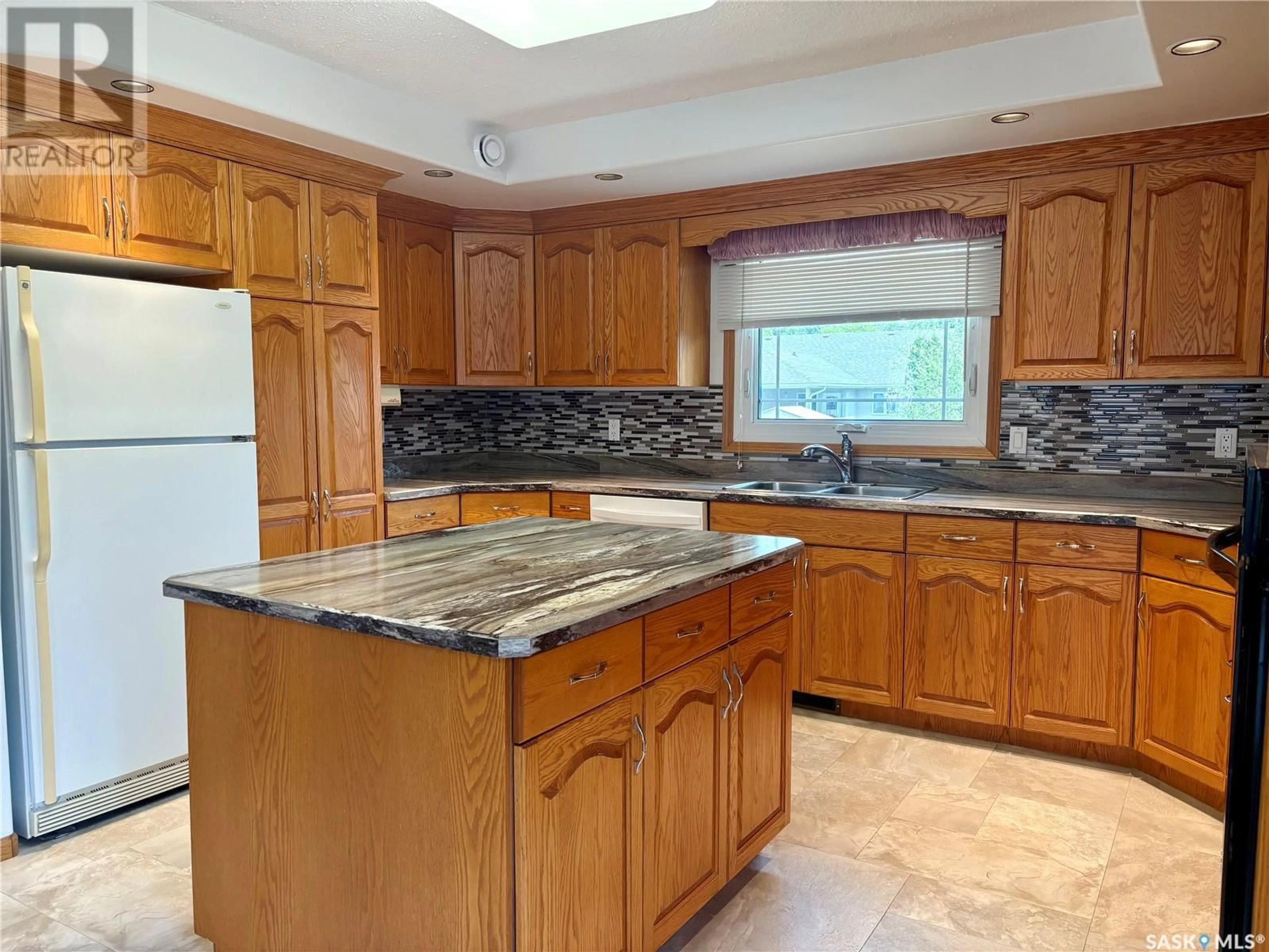 Standard kitchen, ceramic/tile floor for 720 12TH STREET, Humboldt Saskatchewan S0K2A0