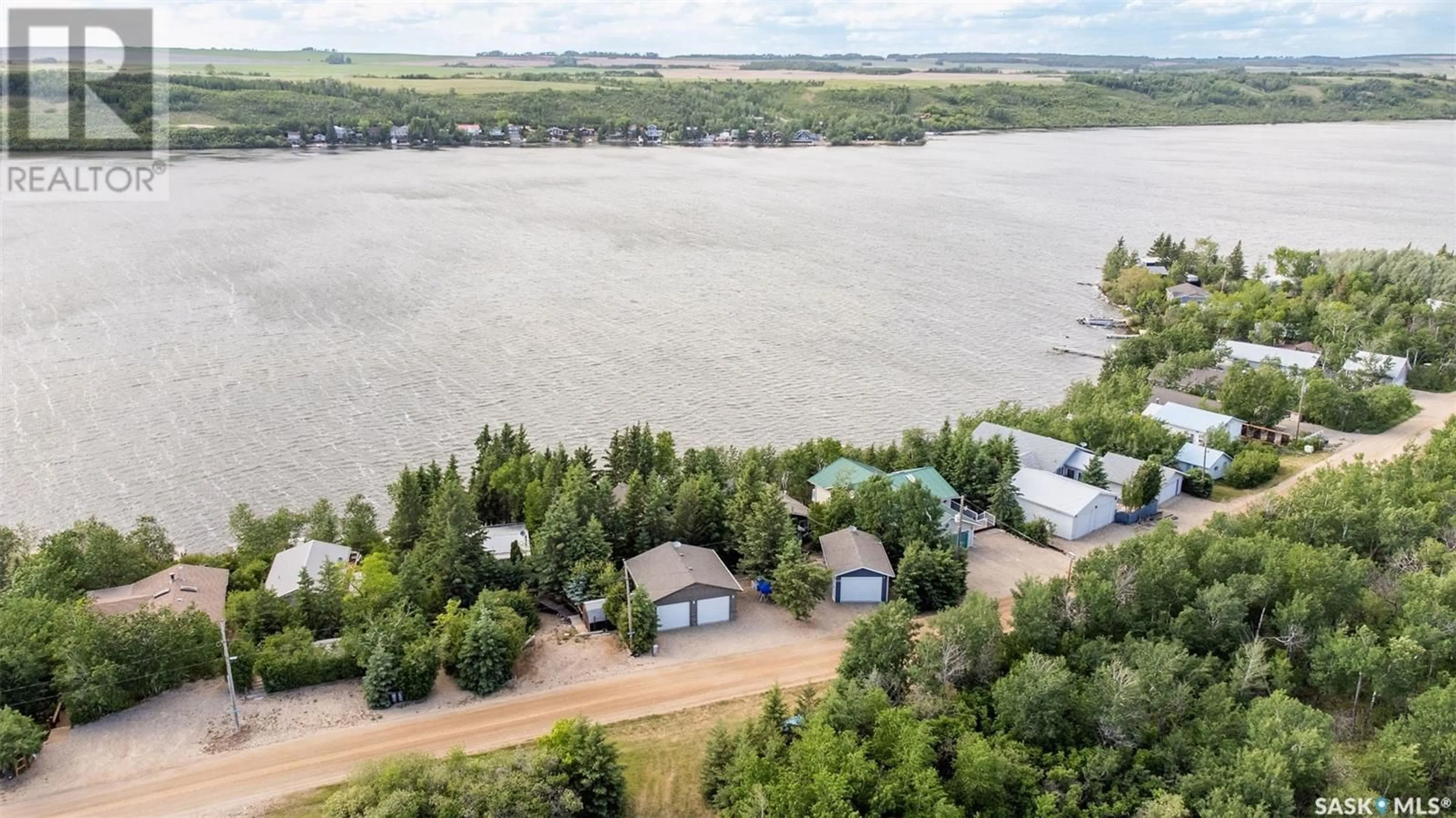 A pic from outside/outdoor area/front of a property/back of a property/a pic from drone, water/lake/river/ocean view for 11 BERARD BEACH, Wakaw Lake Saskatchewan S0K4P0