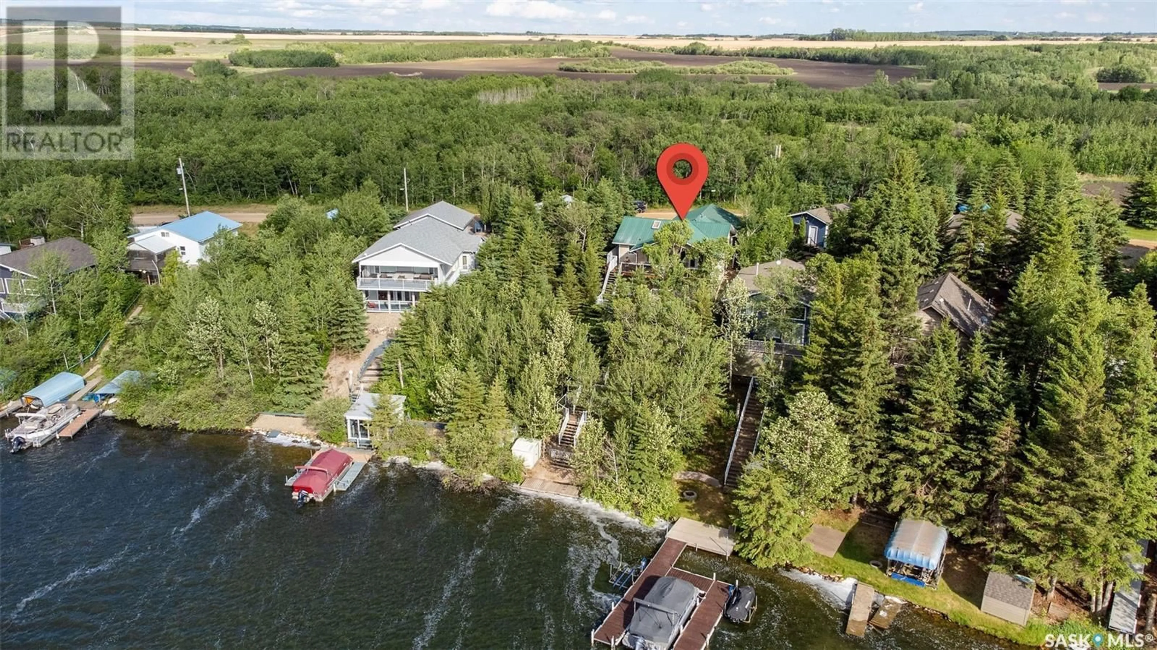 A pic from outside/outdoor area/front of a property/back of a property/a pic from drone, water/lake/river/ocean view for 11 BERARD BEACH, Wakaw Lake Saskatchewan S0K4P0
