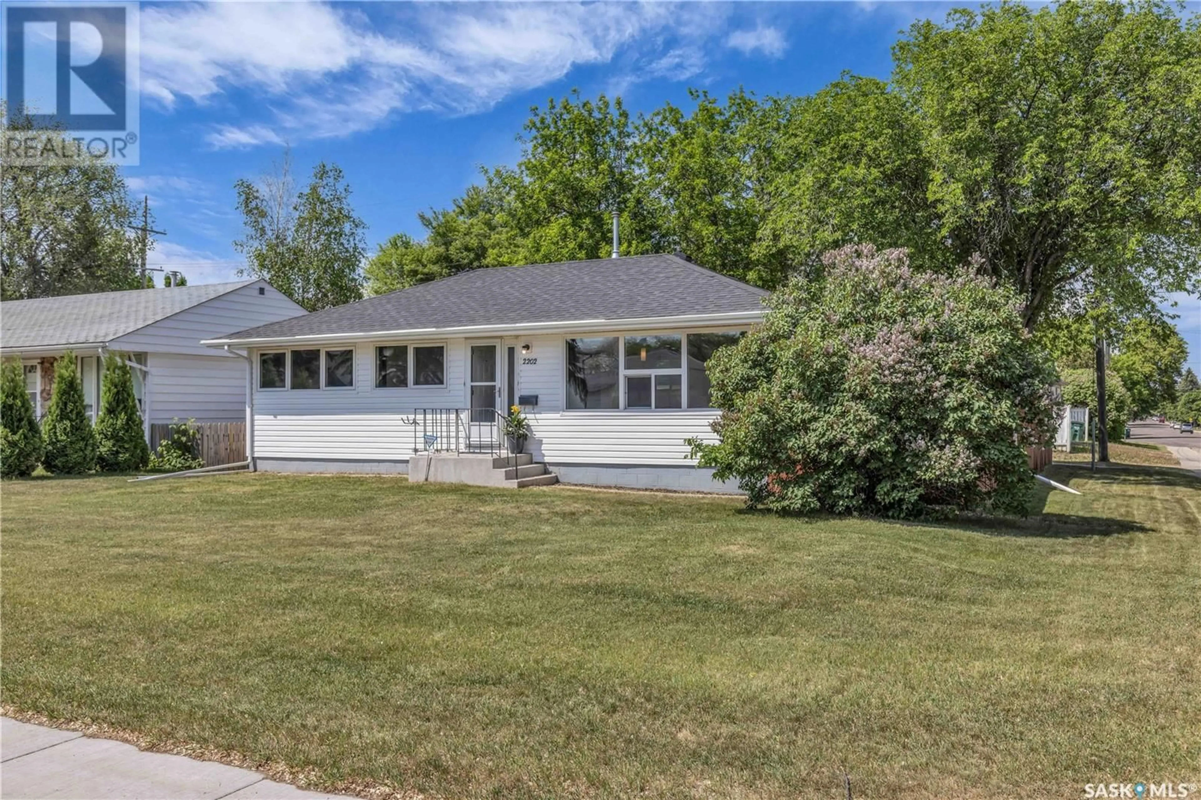 Home with vinyl exterior material, street for 2202 WILLIAM AVENUE, Saskatoon Saskatchewan S7J1A6
