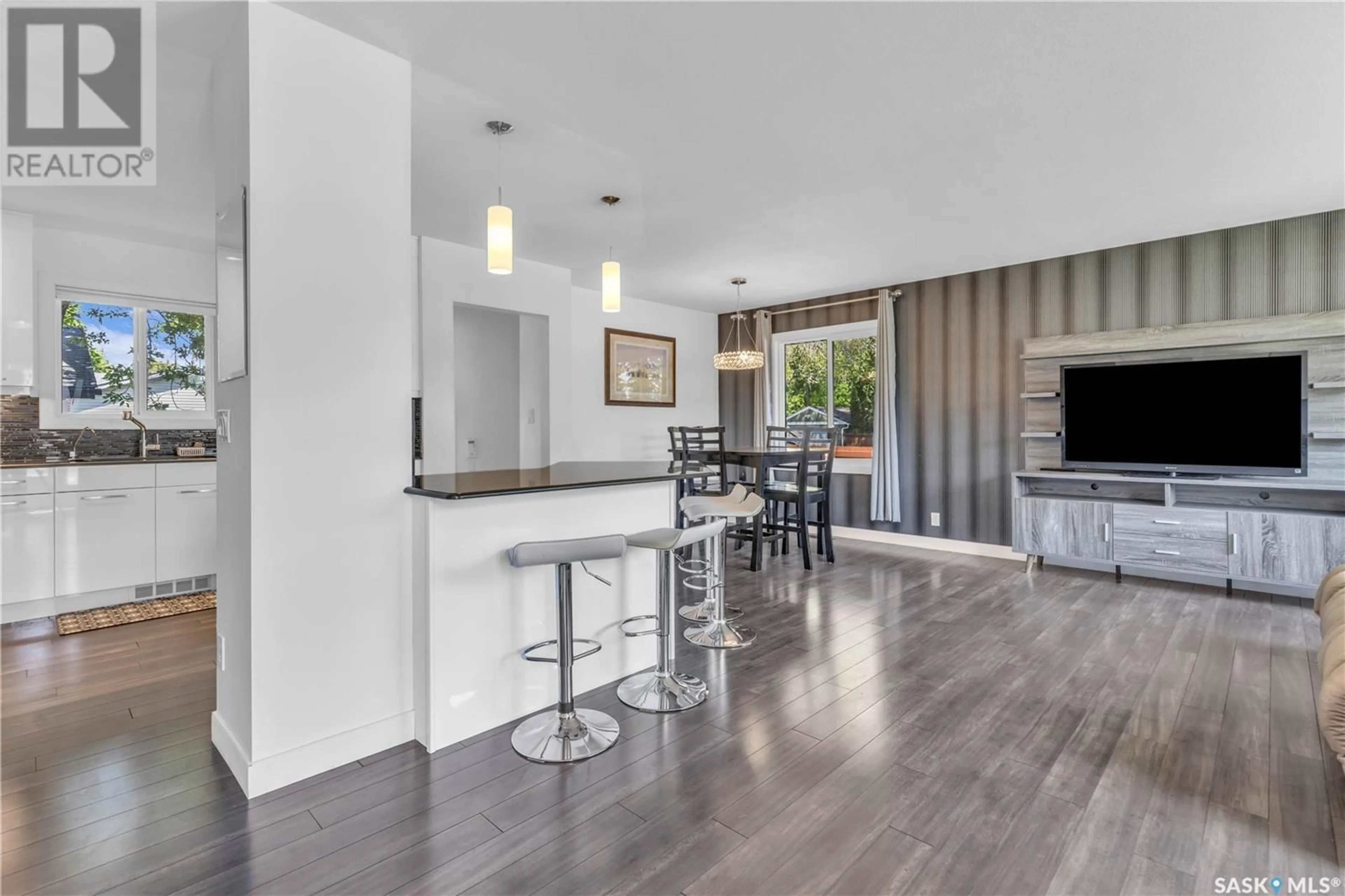 Open concept kitchen, wood/laminate floor for 2202 WILLIAM AVENUE, Saskatoon Saskatchewan S7J1A6