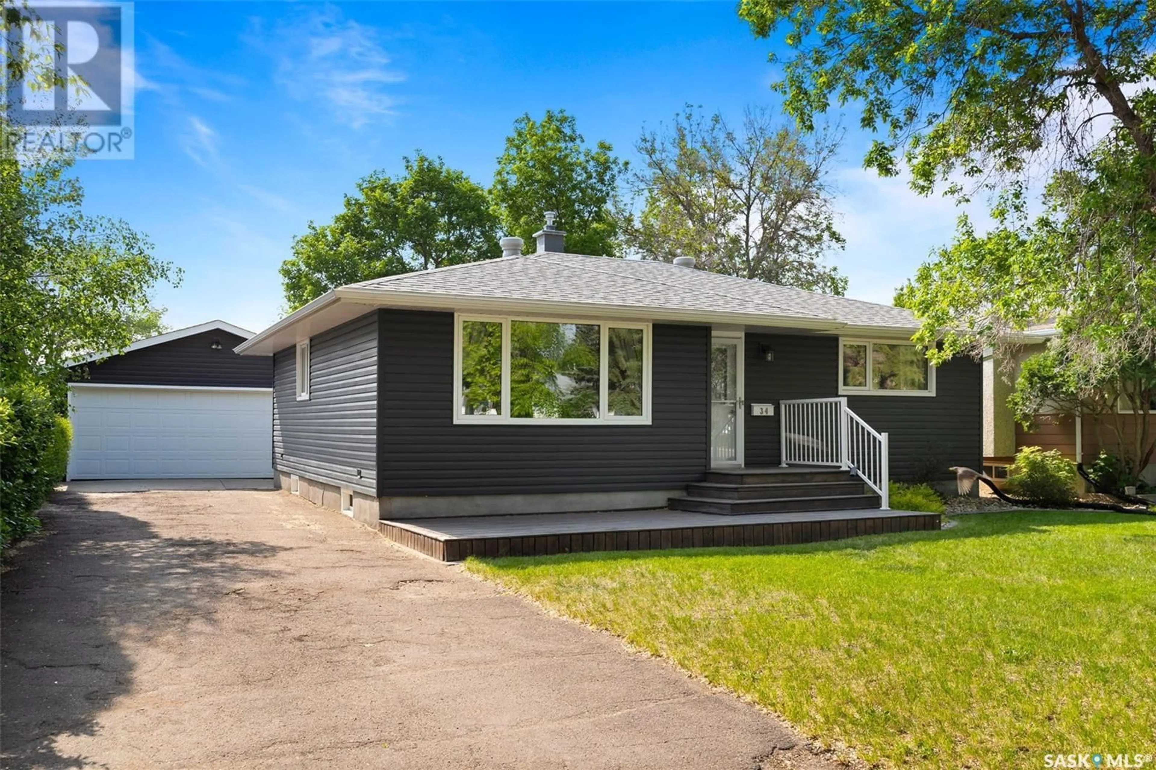 Home with vinyl exterior material, street for 34 MOLLARD CRESCENT, Regina Saskatchewan S4T6J2
