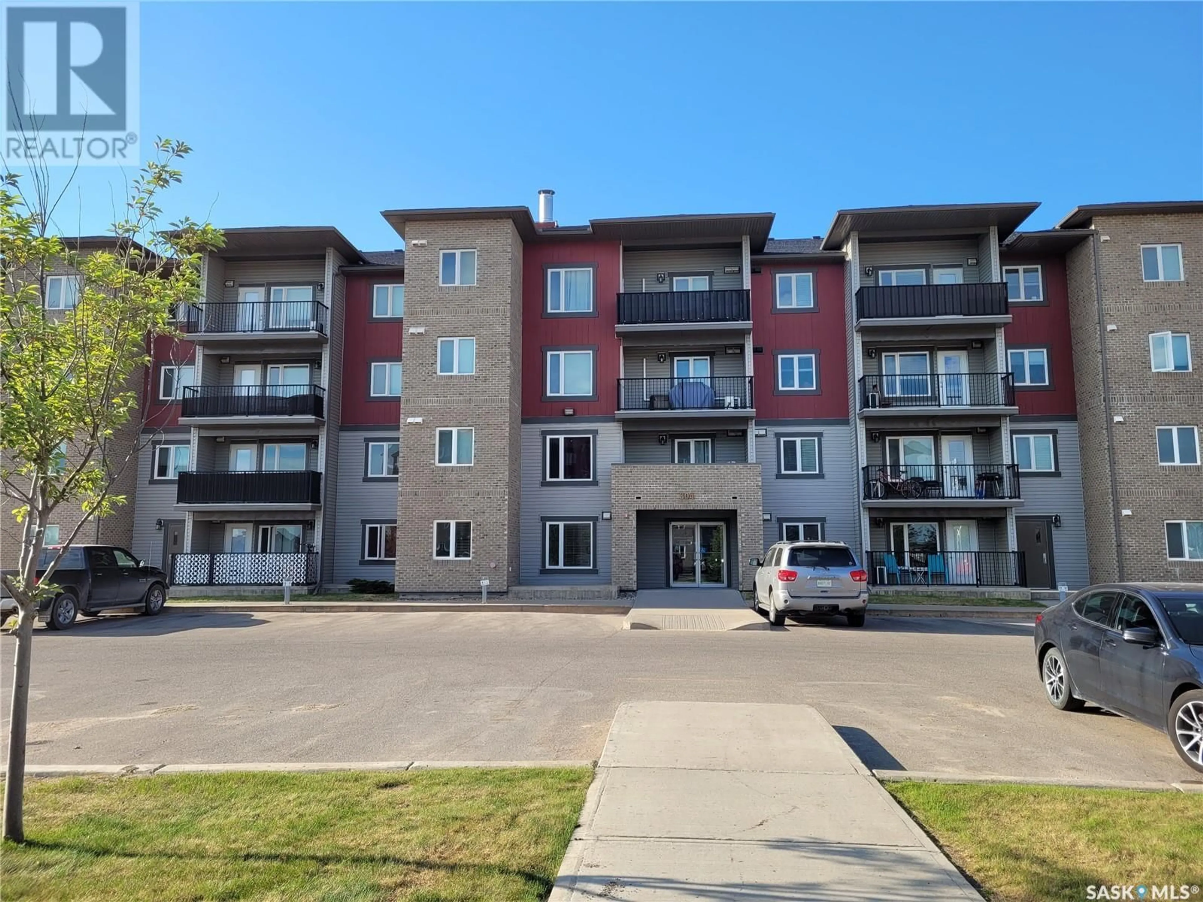A pic from outside/outdoor area/front of a property/back of a property/a pic from drone, building for 404 308 PETTERSON DRIVE, Estevan Saskatchewan S4A2B8