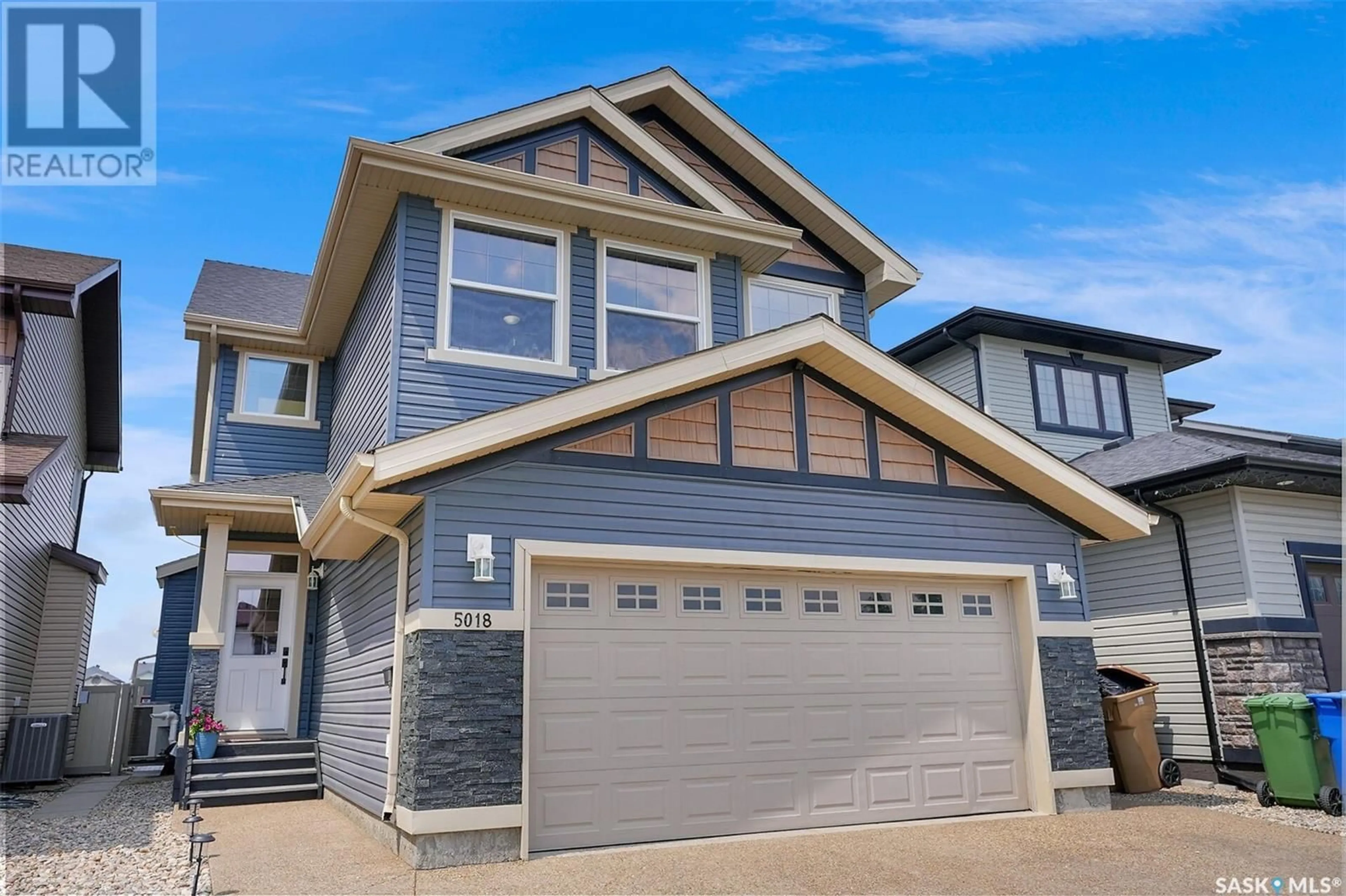 Home with vinyl exterior material, street for 5018 PADWICK ROAD, Regina Saskatchewan S4W0C4