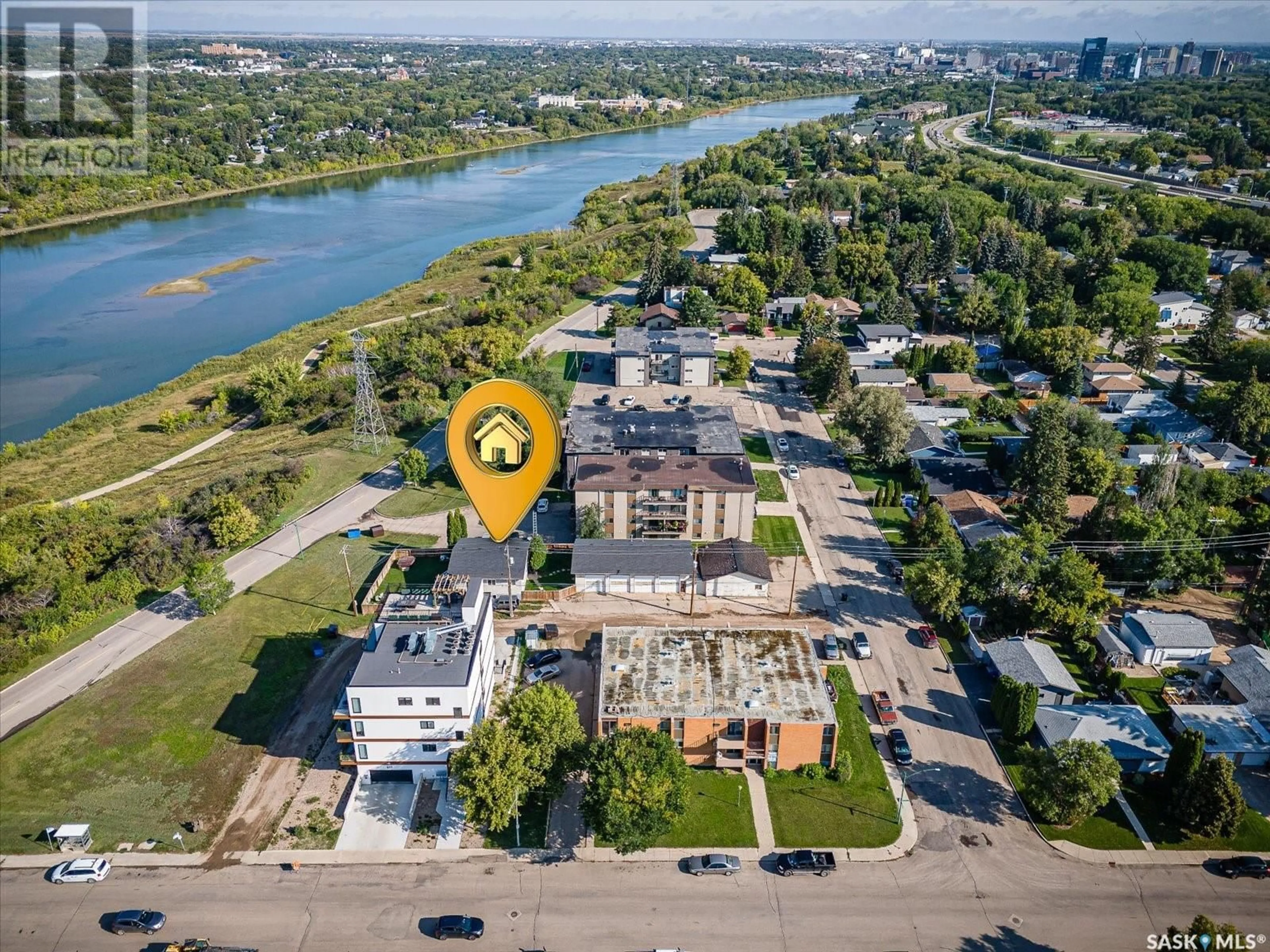 A pic from outside/outdoor area/front of a property/back of a property/a pic from drone, water/lake/river/ocean view for 2126 STE CECILIA AVENUE, Saskatoon Saskatchewan S7M0P2