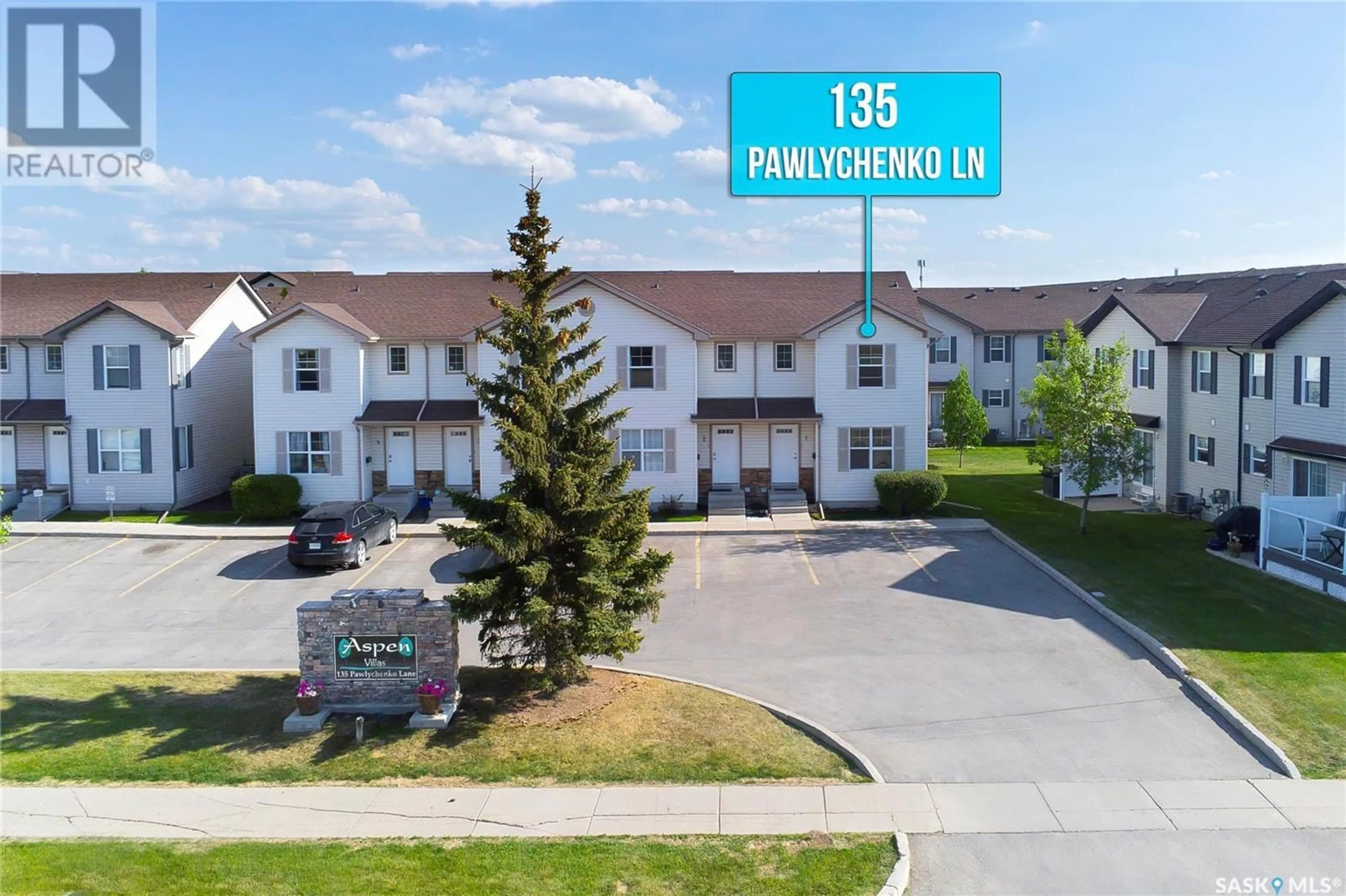 A pic from outside/outdoor area/front of a property/back of a property/a pic from drone, unknown for 1 - 135 PAWLYCHENKO LANE, Saskatoon Saskatchewan S7V1J8