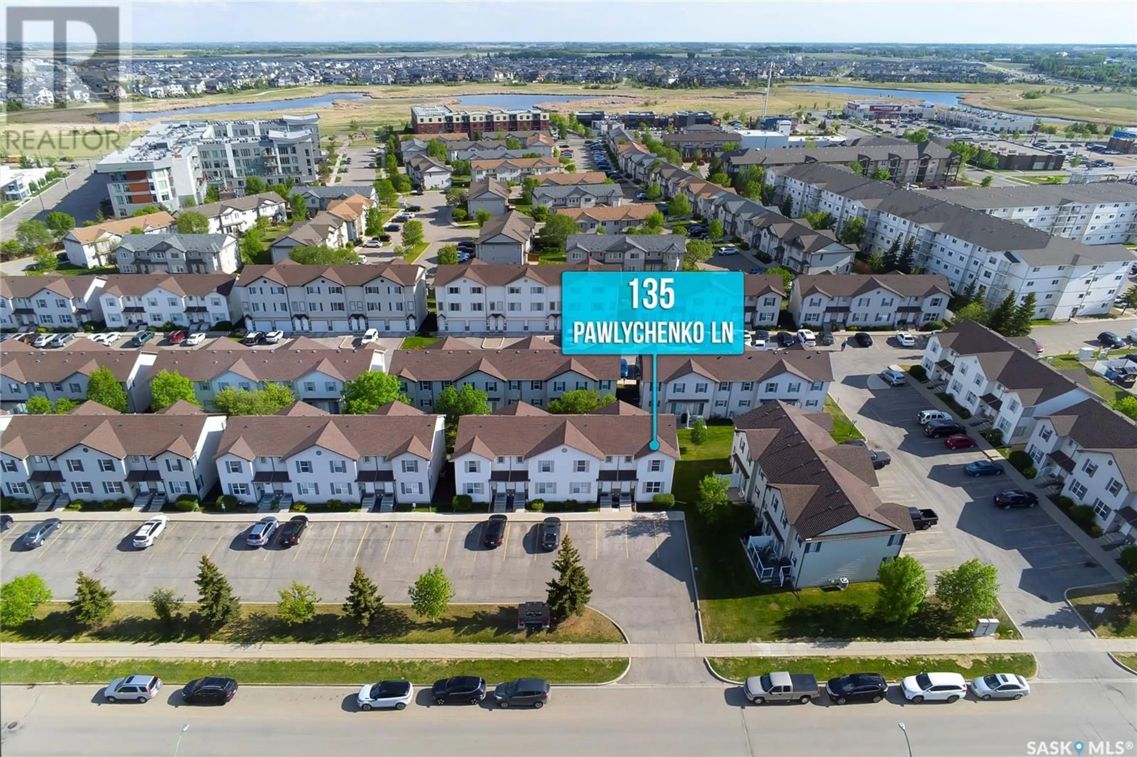 A pic from outside/outdoor area/front of a property/back of a property/a pic from drone, street for 1 - 135 PAWLYCHENKO LANE, Saskatoon Saskatchewan S7V1J8