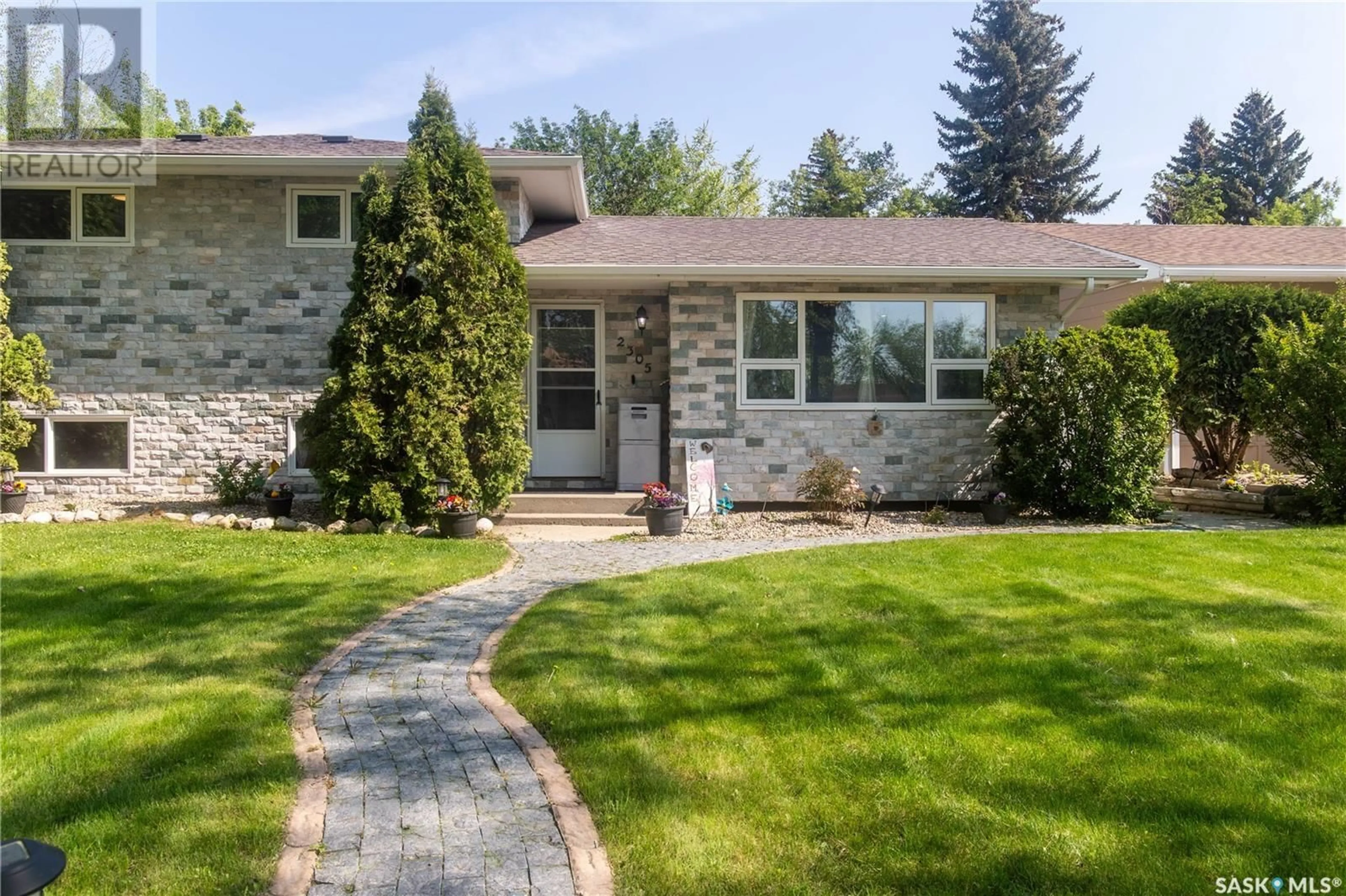 Home with brick exterior material, street for 2305 TAYLOR STREET, Saskatoon Saskatchewan S7H1W8