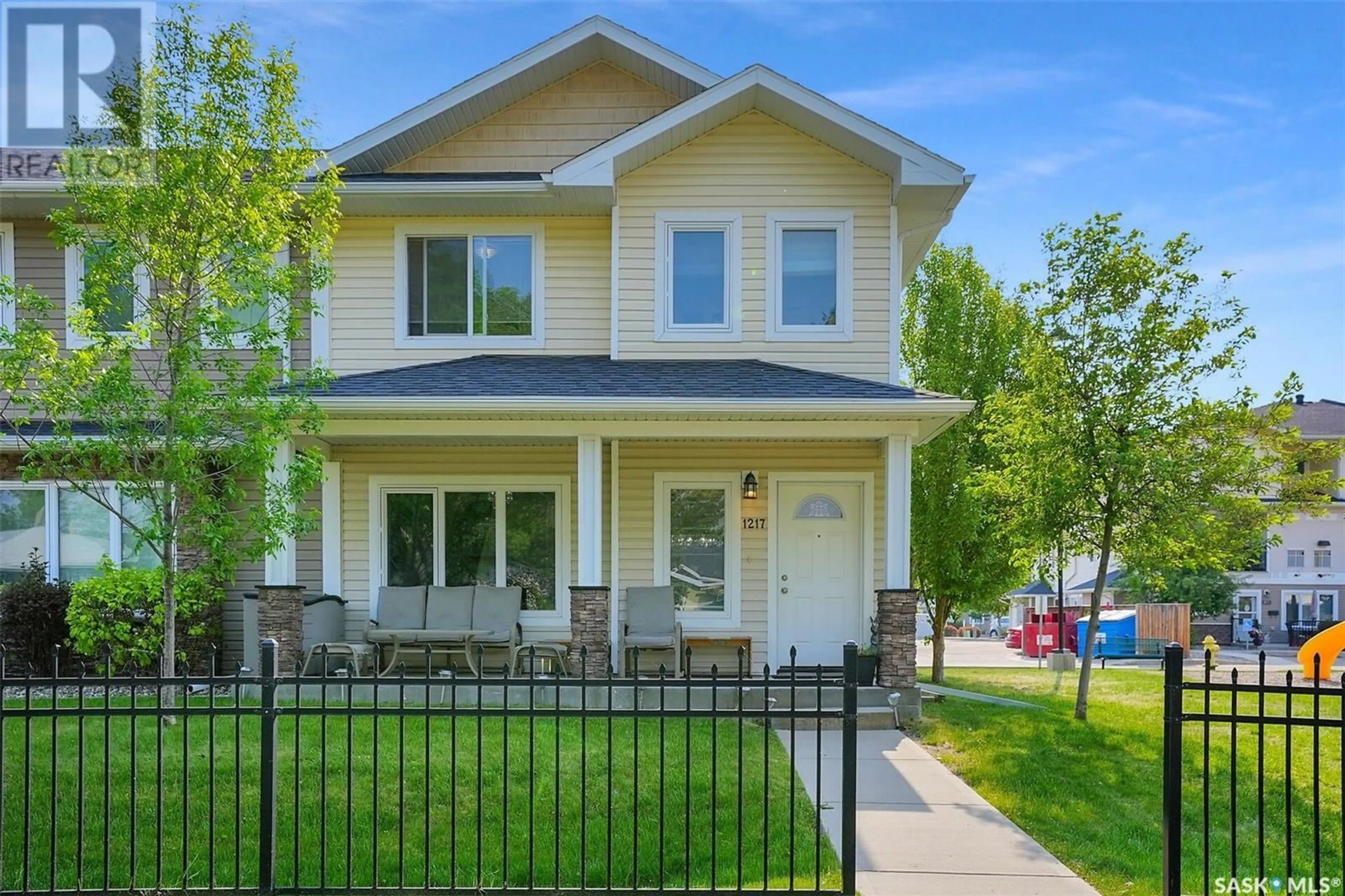 Home with vinyl exterior material, street for 1217 GREY STREET, Regina Saskatchewan S4T1G7